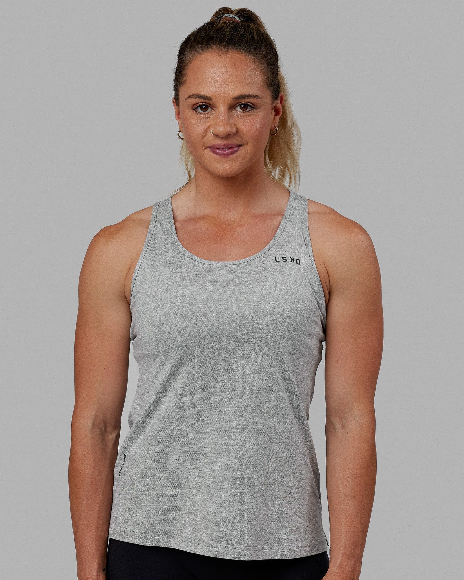 Woman wearing Perform VapourFLX Tank - Lt Grey Marl
