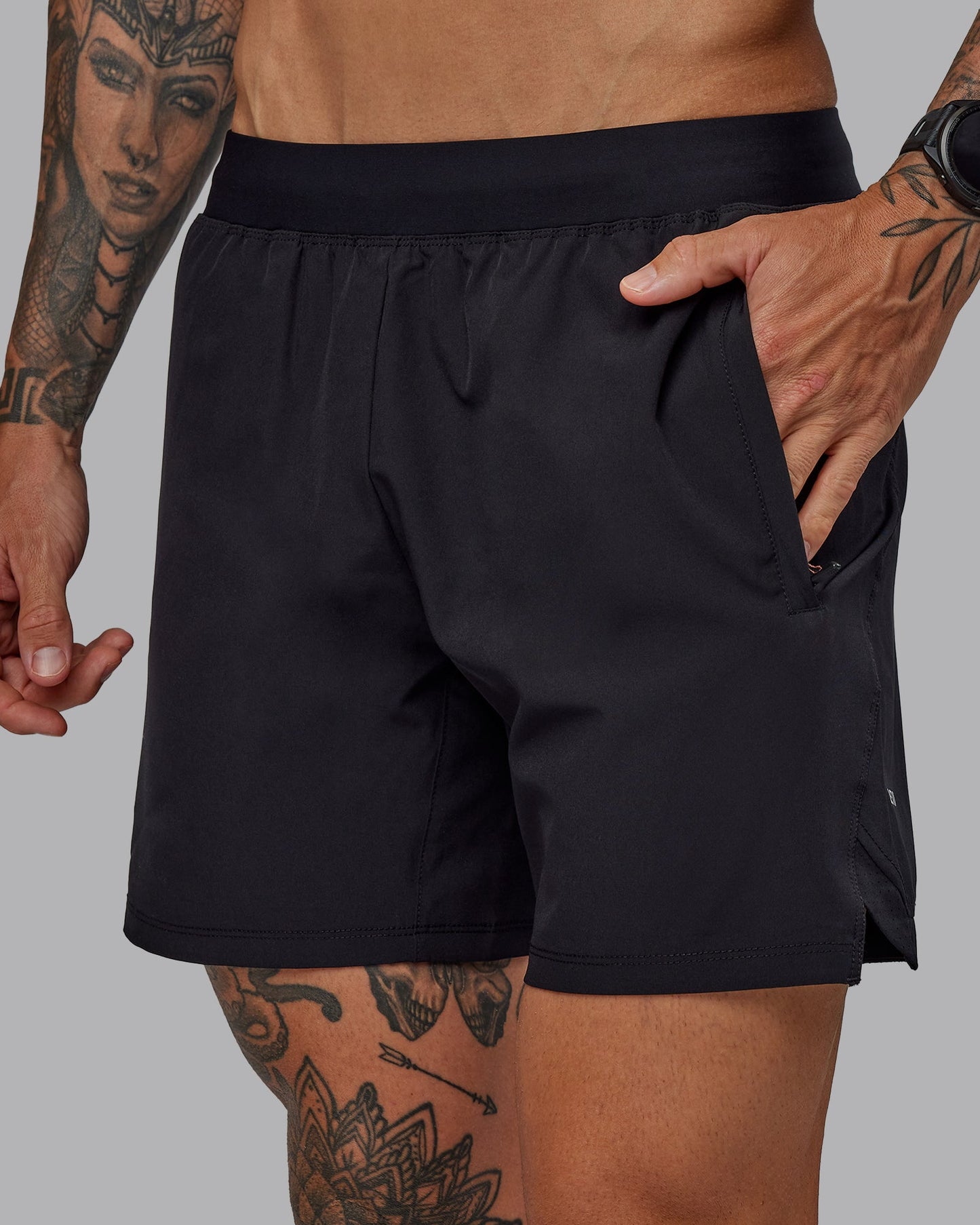 Man wearing Challenger 6" Performance Shorts in Black | Size:S