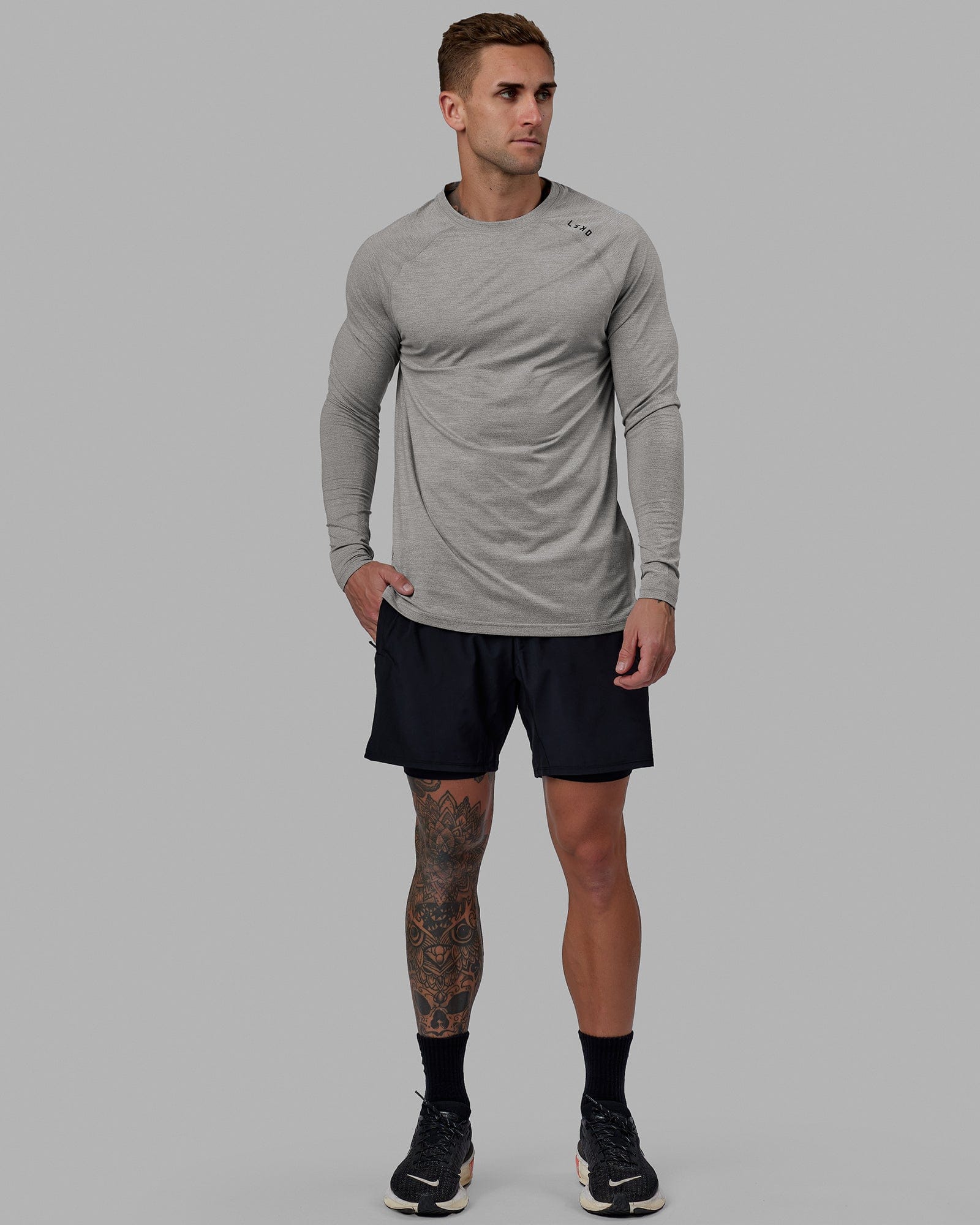 Man wearing Challenger 6" Lined Performance Short - Black