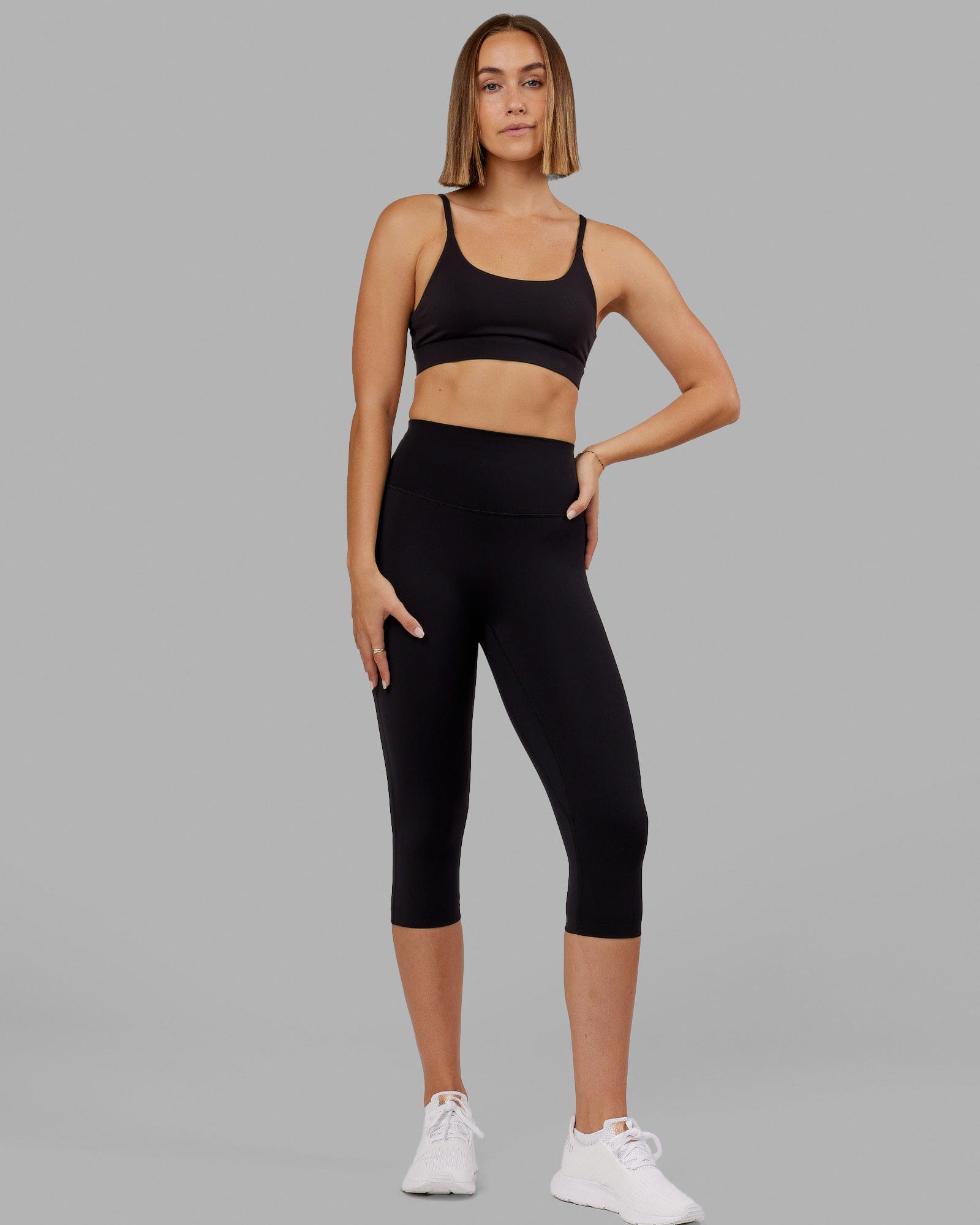 Woman wearing Elixir 3/4 Length Tight - Black No Logo