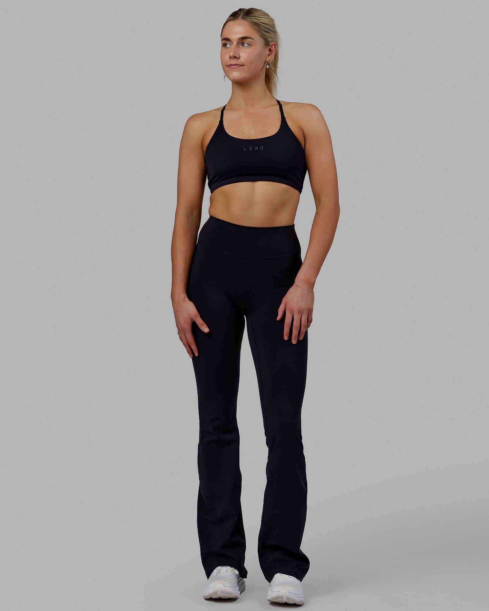 Woman wearing Everyday Flare X-Long Tight - Black
