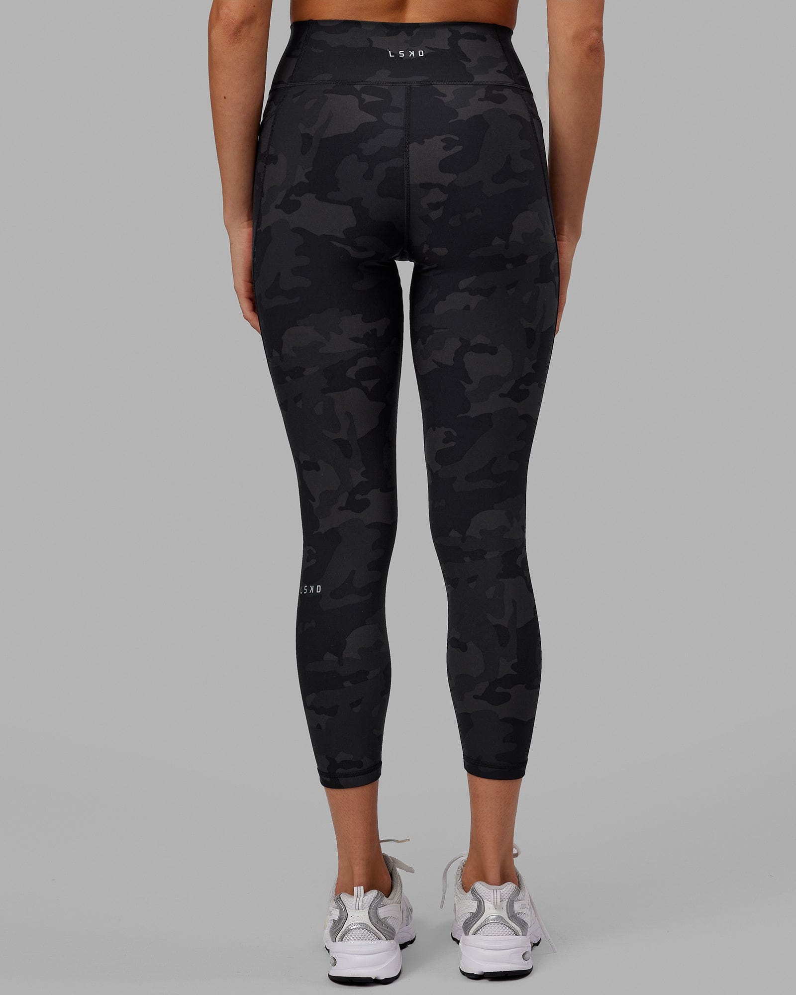 Woman wearing Fusion 7/8 Length Tight - Black-Camo