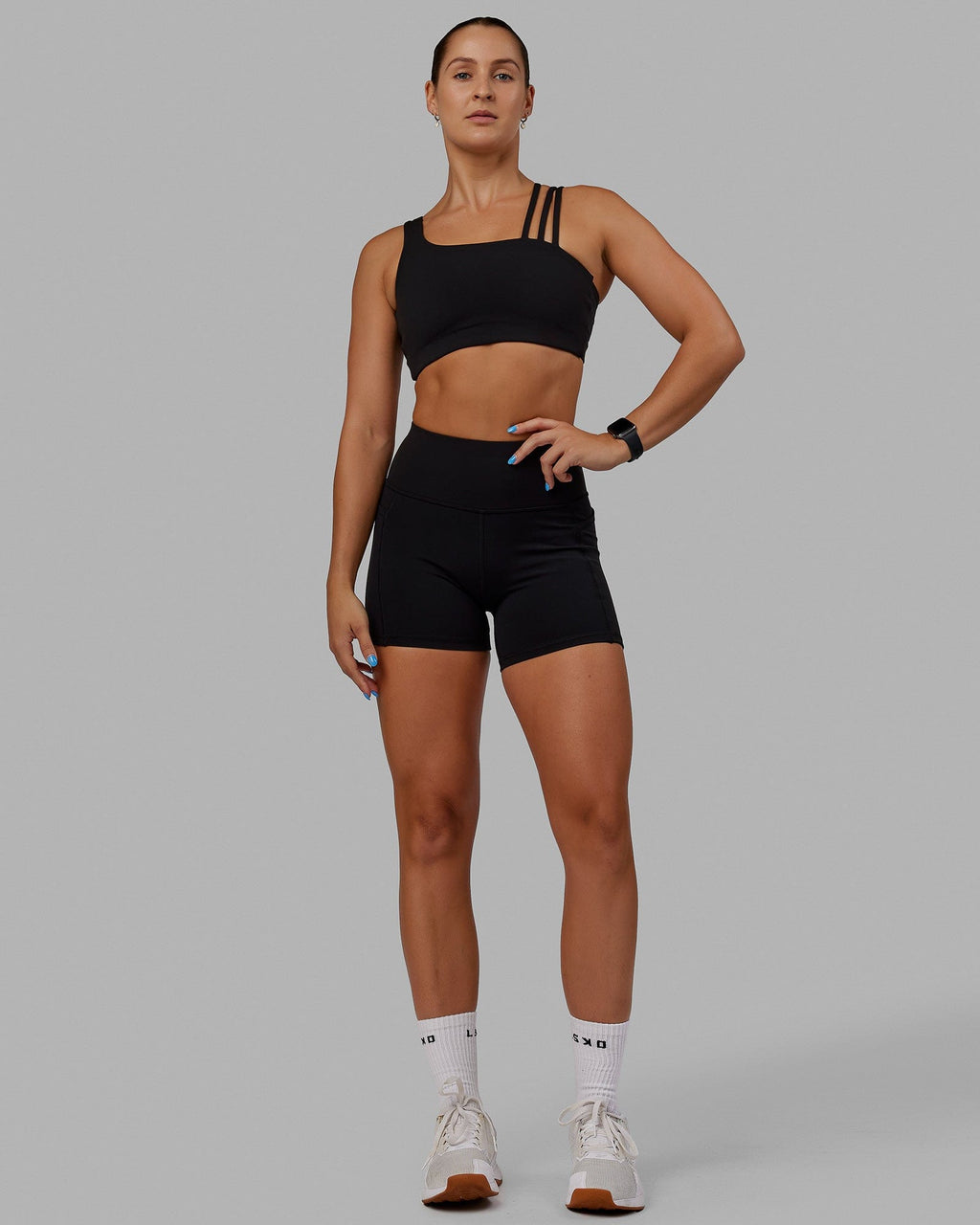 Woman wearing Galvanise Sports Bra - Black