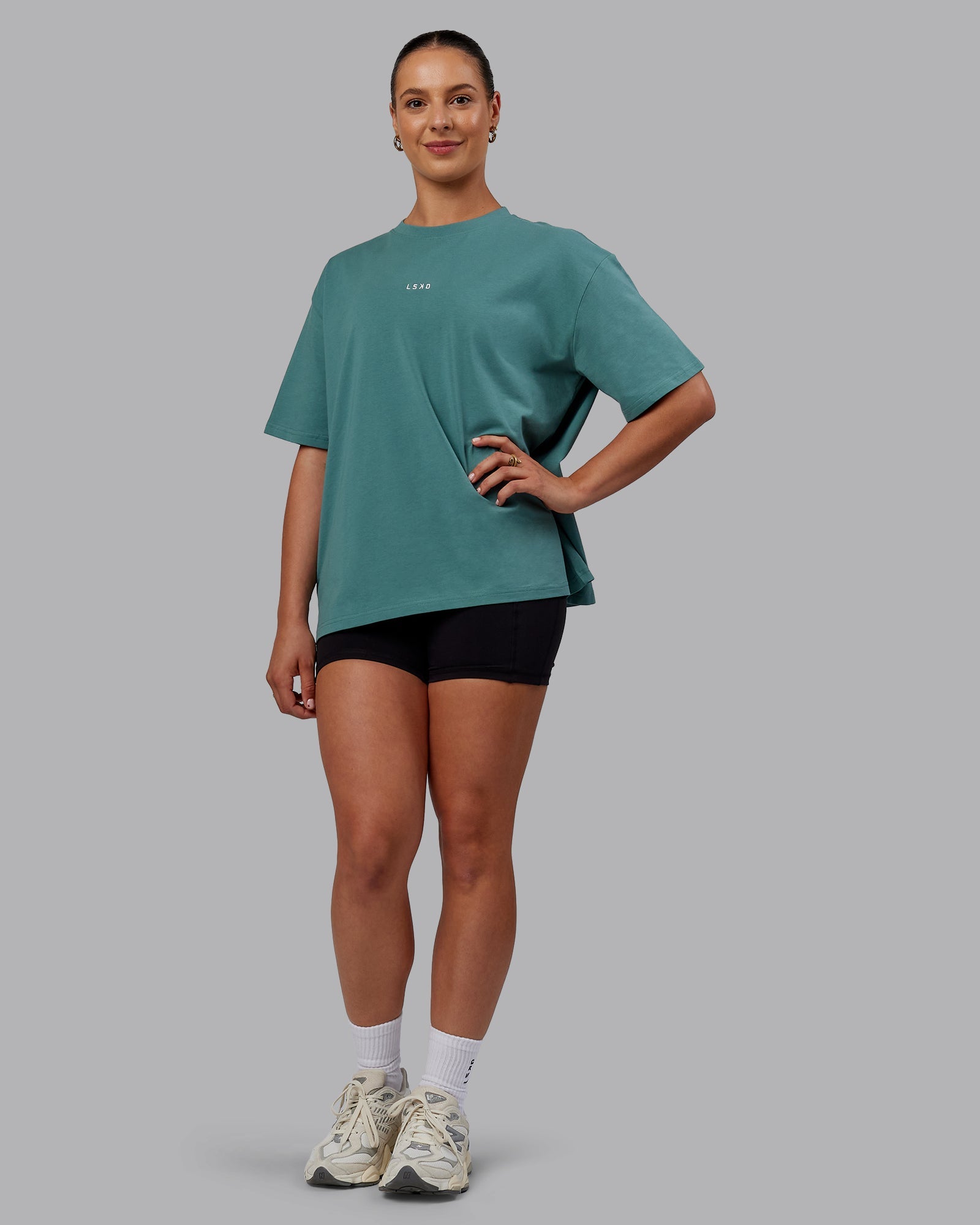 Woman wearing Go-To FLXCotton Oversized Tee - Sage Bush-White