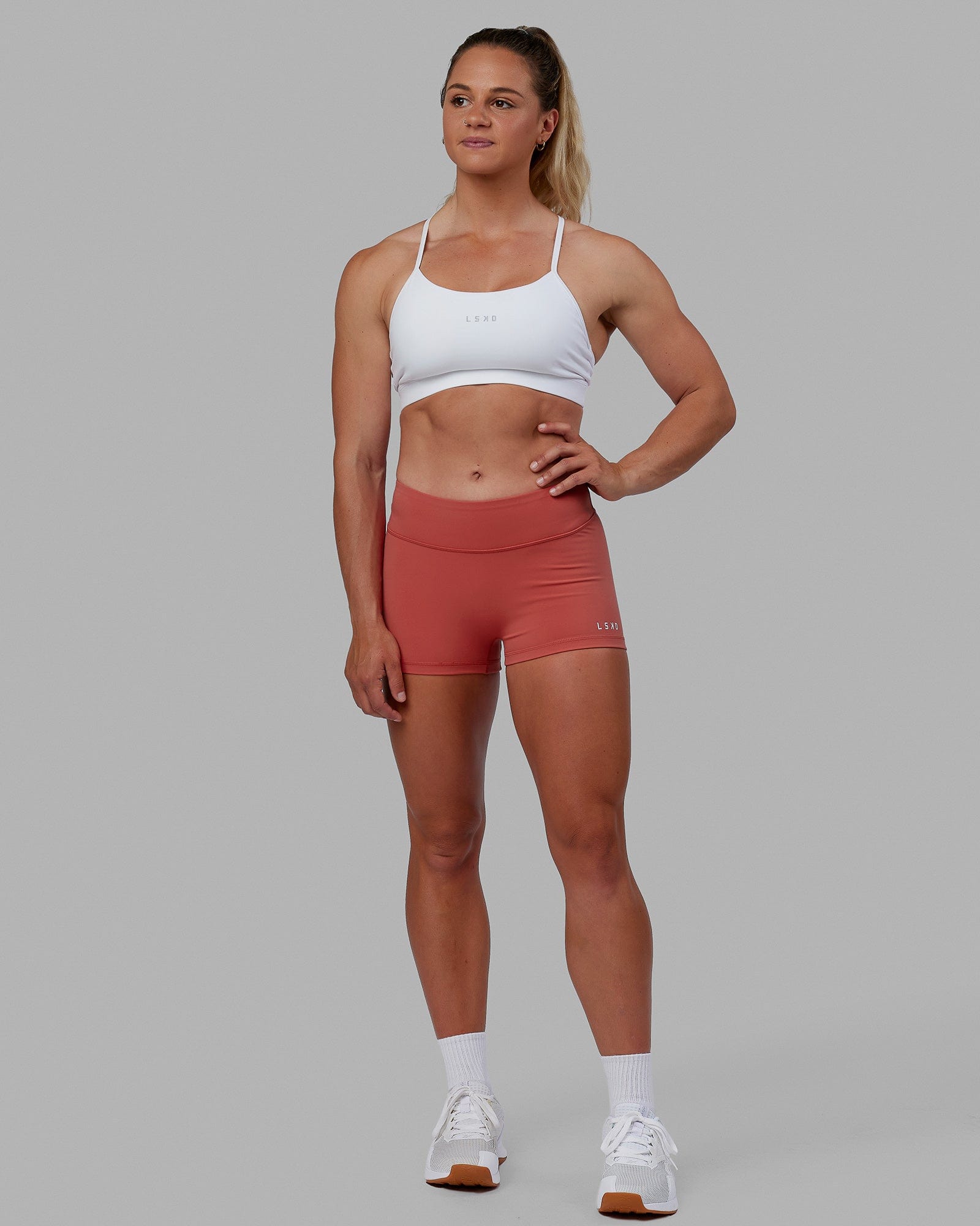Woman wearing Lift Sports Bra - White