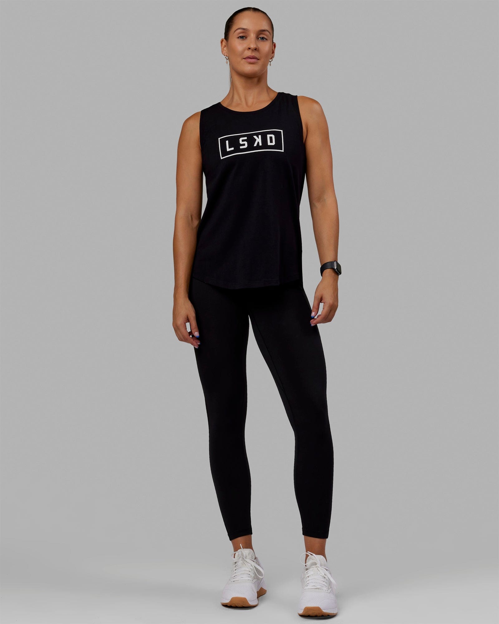 Woman wearing Luna FLXCotton Longline Tank - Black-White