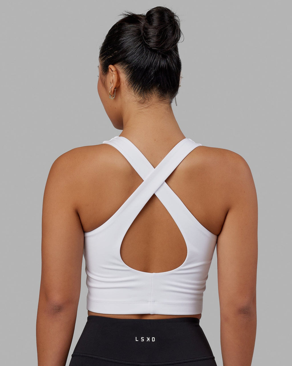 Woman wearing Pulse Active Tank - White