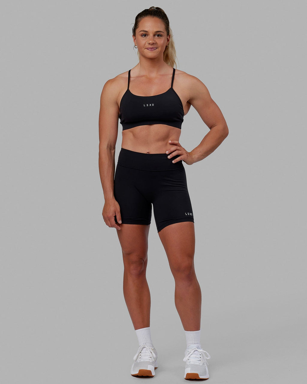 Woman wearing RXD Mid Short Tight - Black