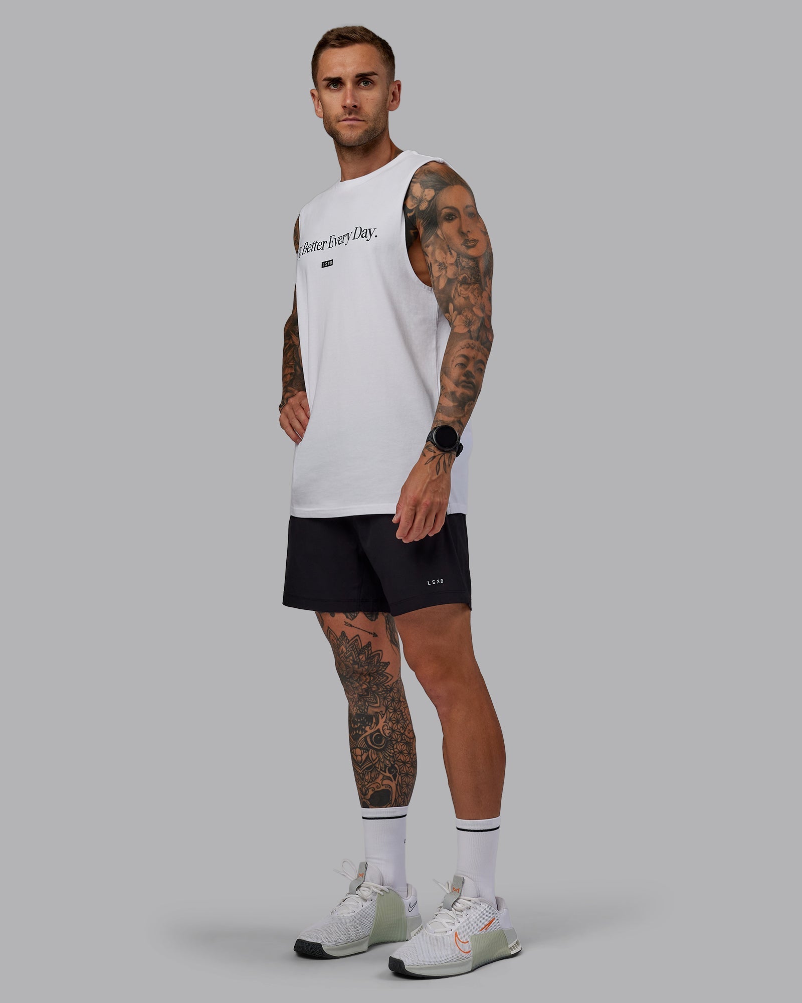 Man wearing Rep 5" Lined Performance Shorts in Black | Size:S