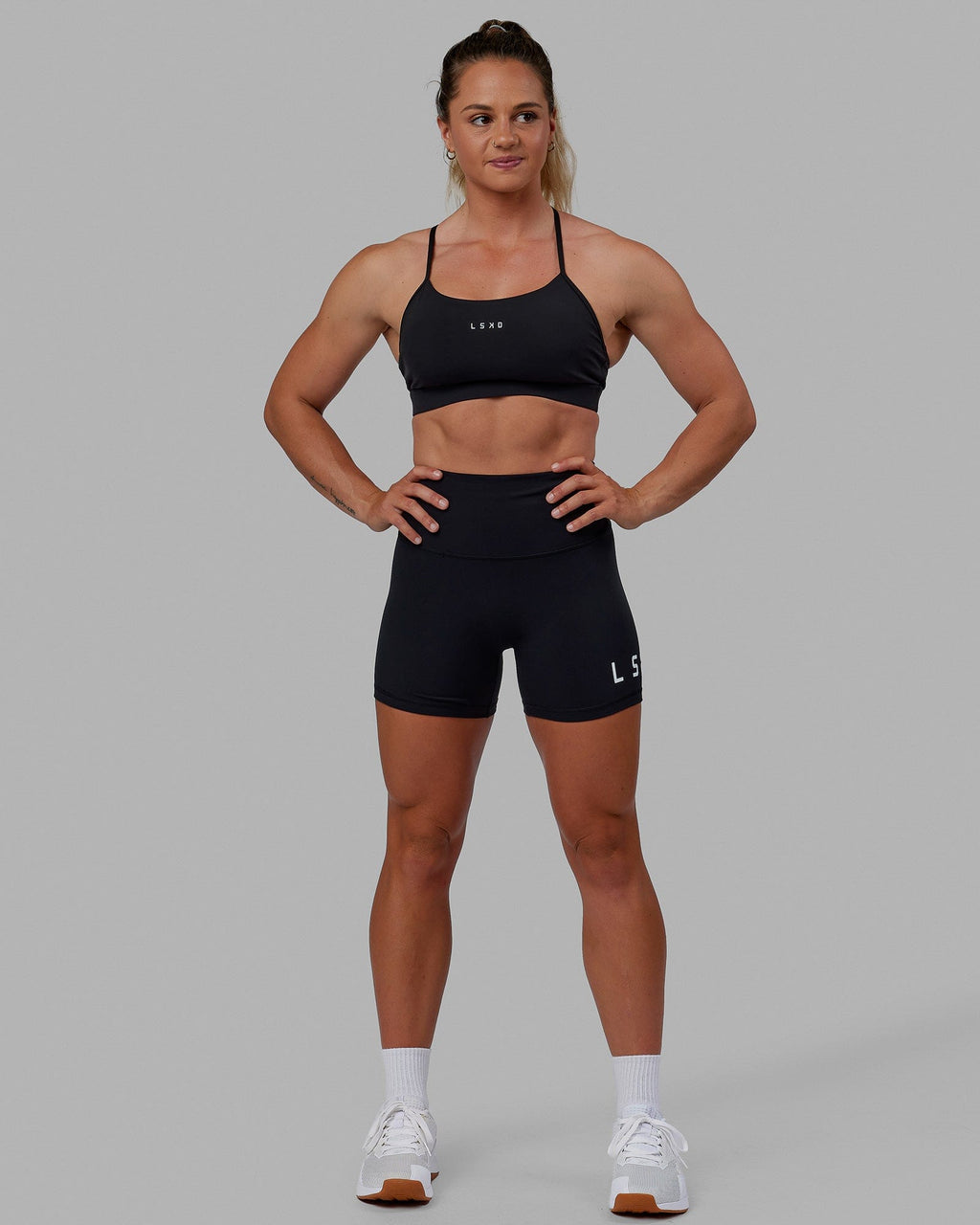 Woman wearing Lift Sports Bra - Black