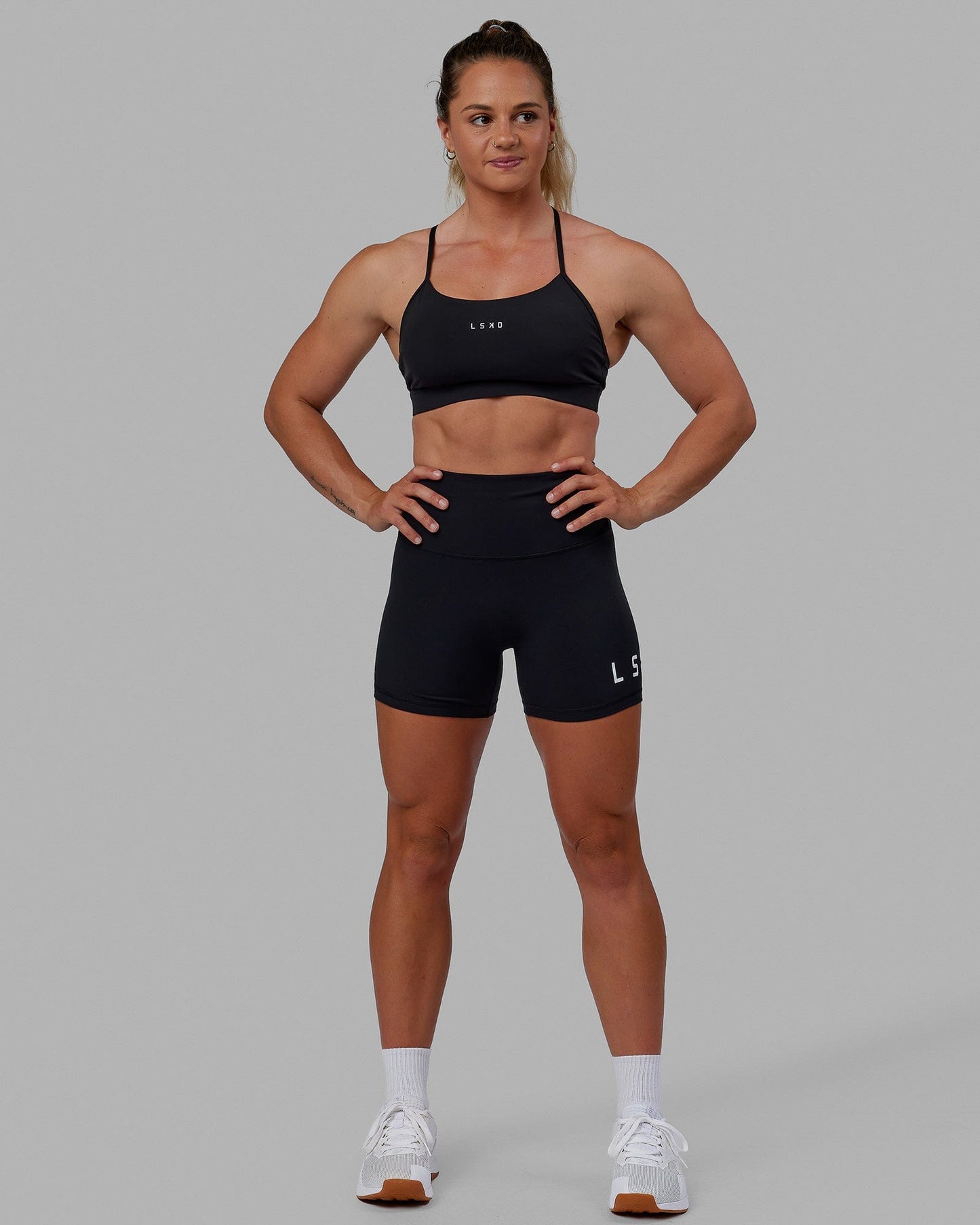 Woman wearing Lift Sports Bra - Black