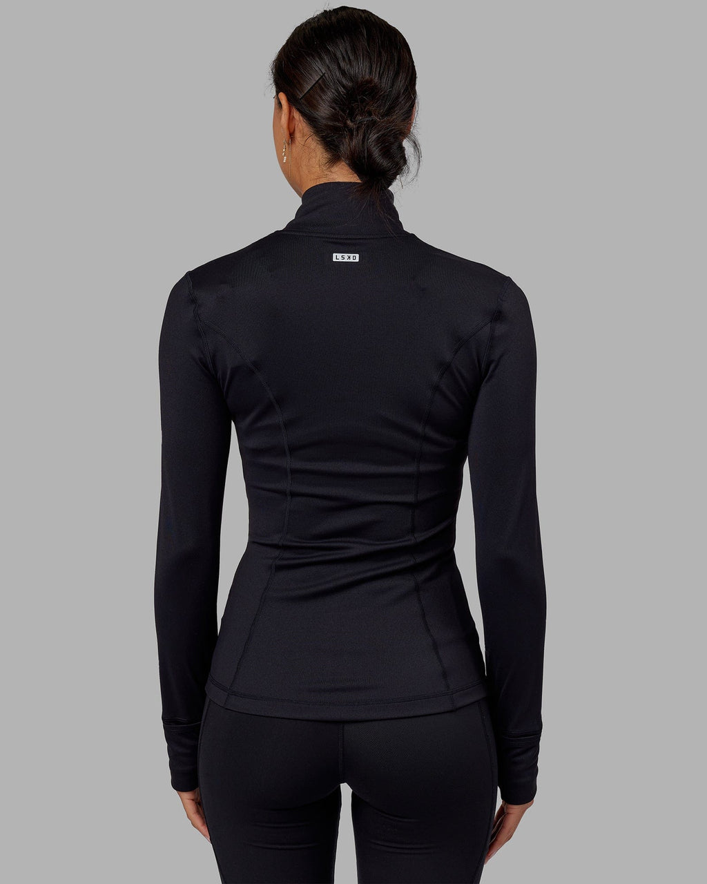 Woman wearing Stride Zip Through Jacket - Black