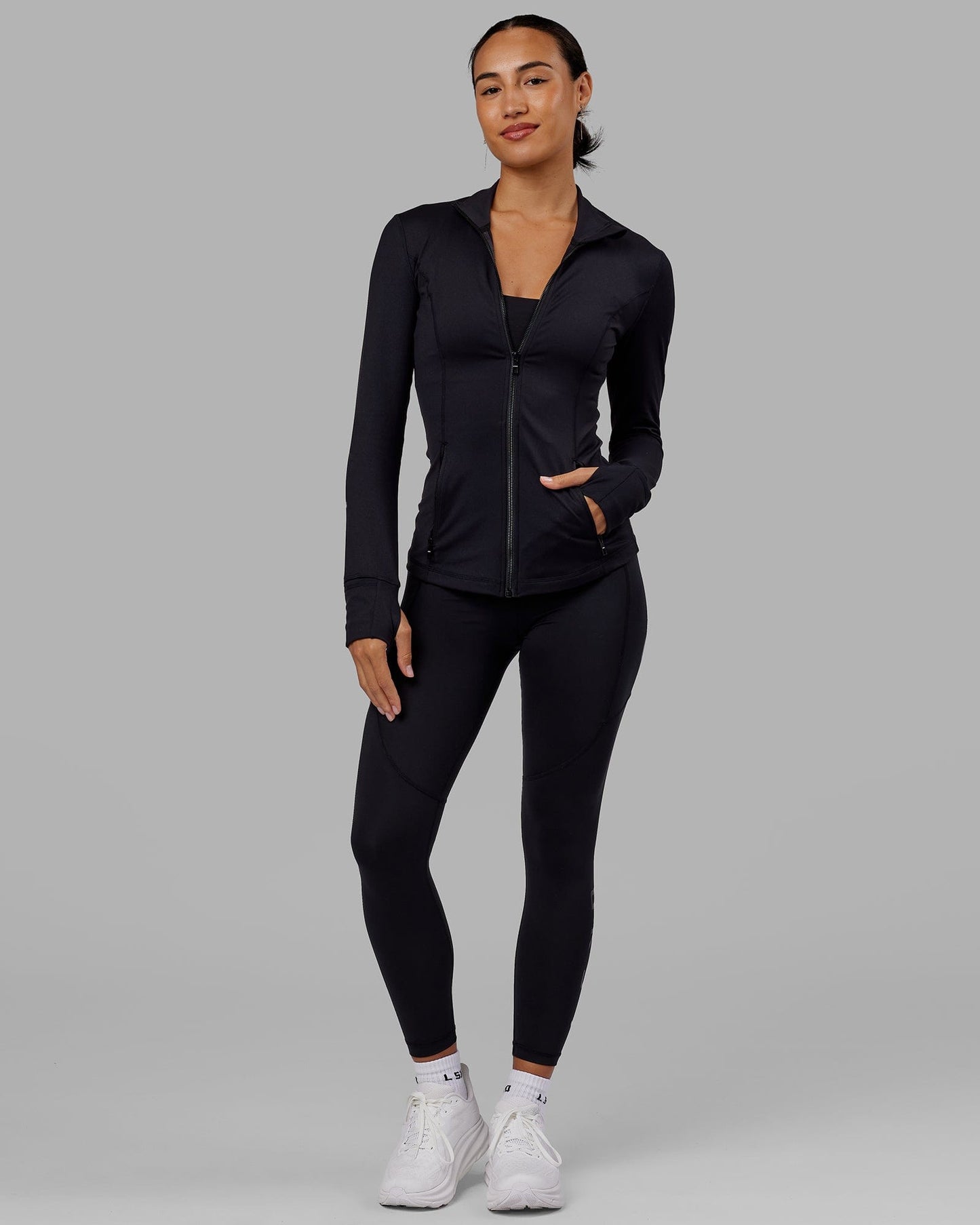 Woman wearing Stride Zip Through Jacket - Black