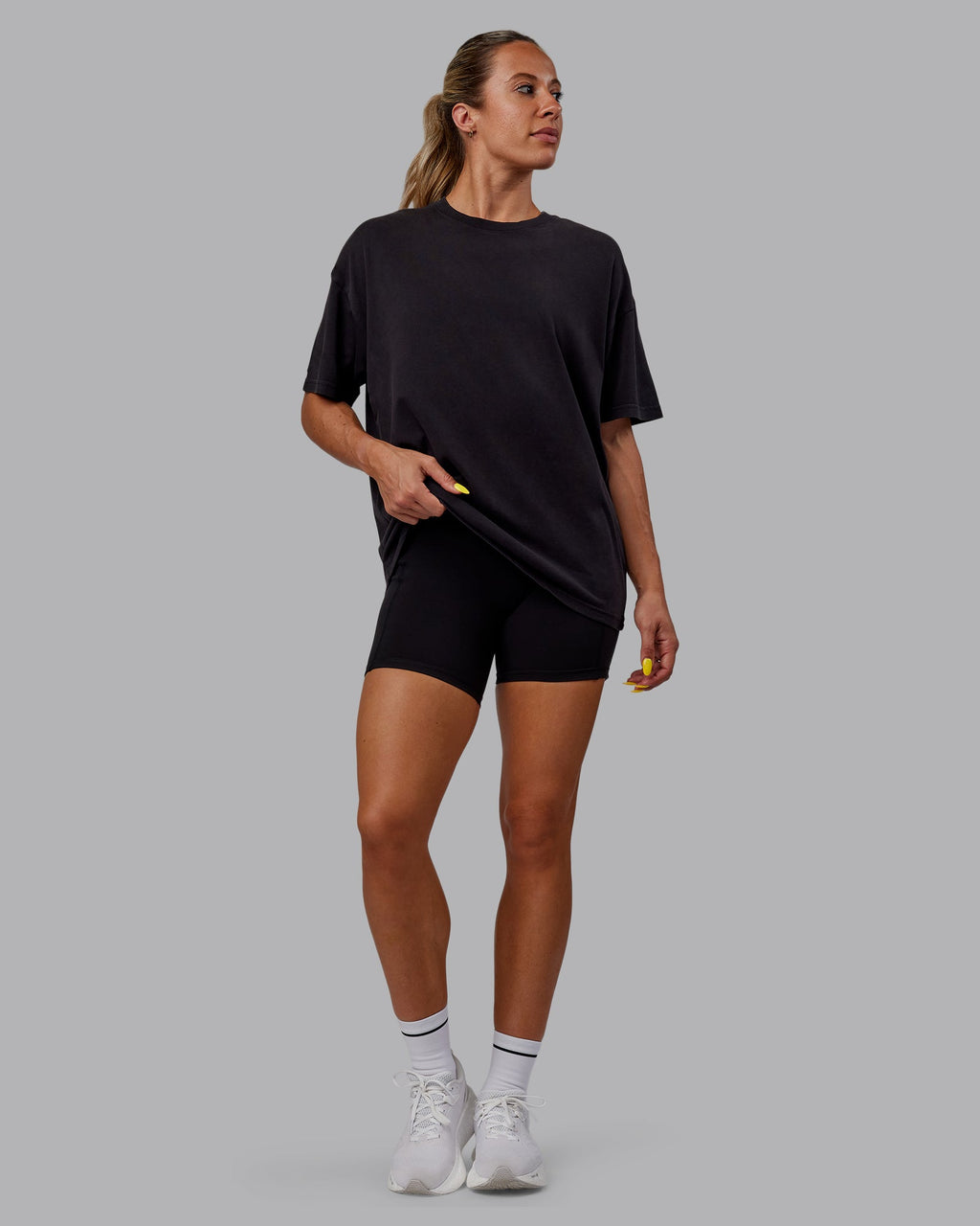 Woman wearing Unisex Washed Pressure Heavyweight Tee Oversize - Black-White