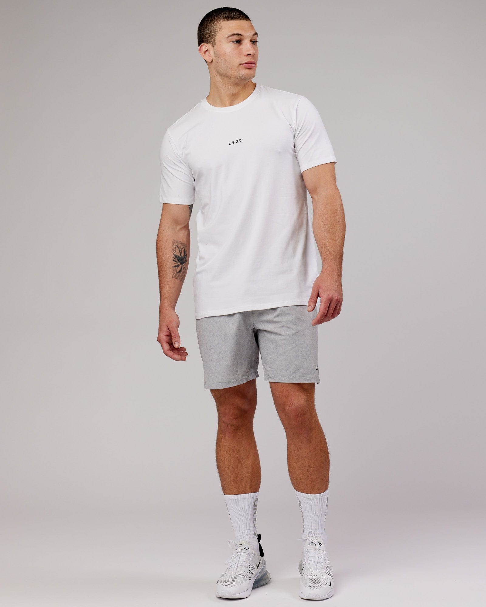 Man wearing Base FLXCotton Tee - White