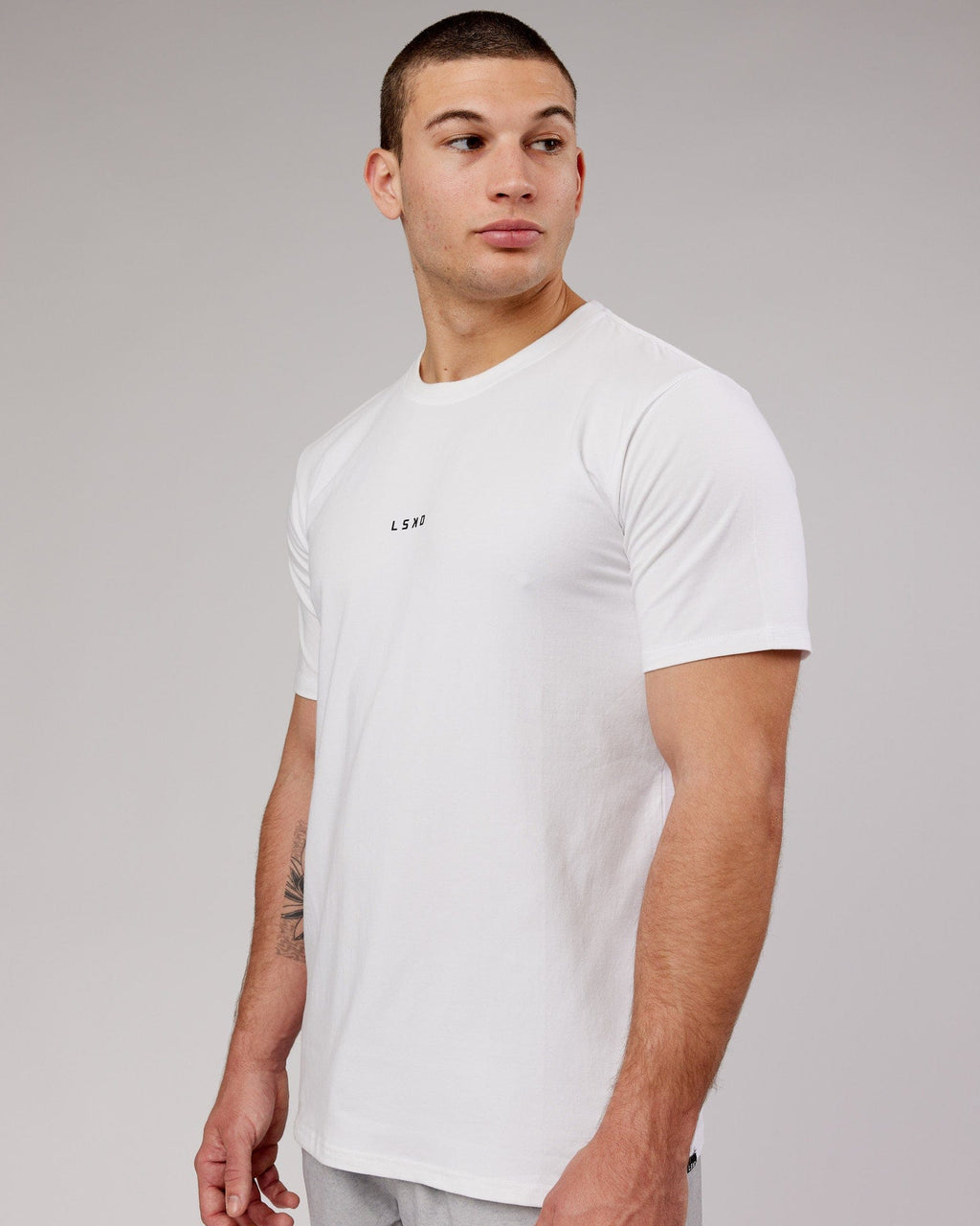 Man wearing Base FLXCotton Tee - White