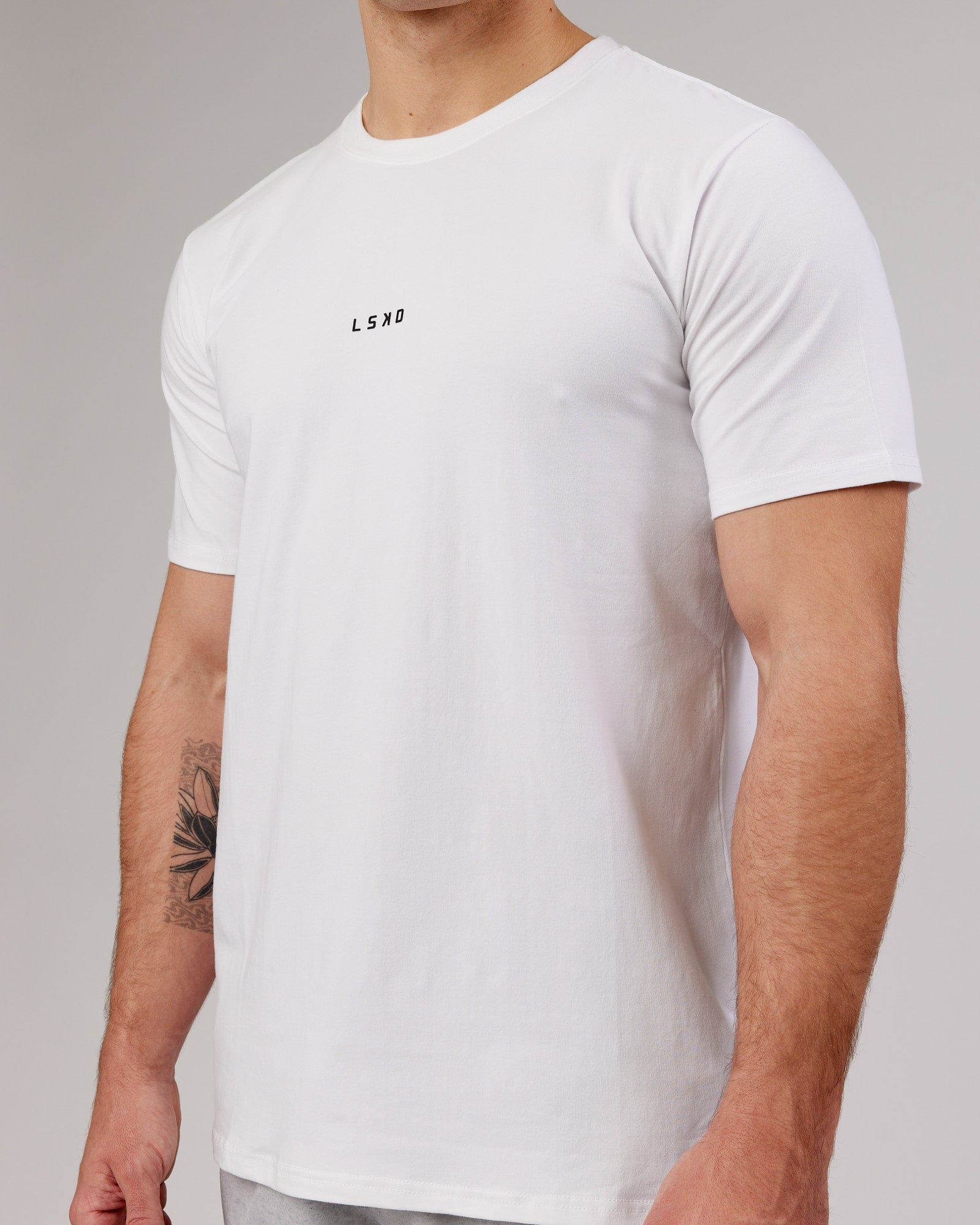 Man wearing Base FLXCotton Tee - White