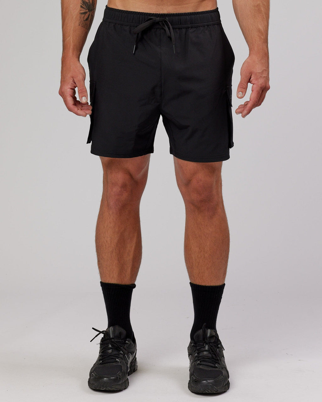 Man wearing Energy Stretch Performance Cargo Short - Black