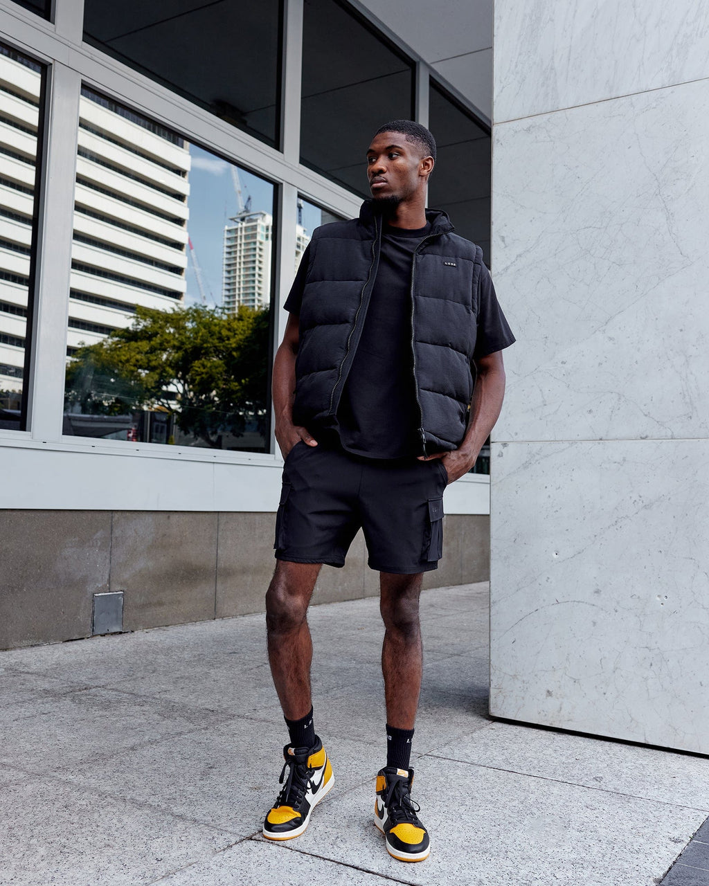 Man wearing Energy Stretch Performance Cargo Short - Black