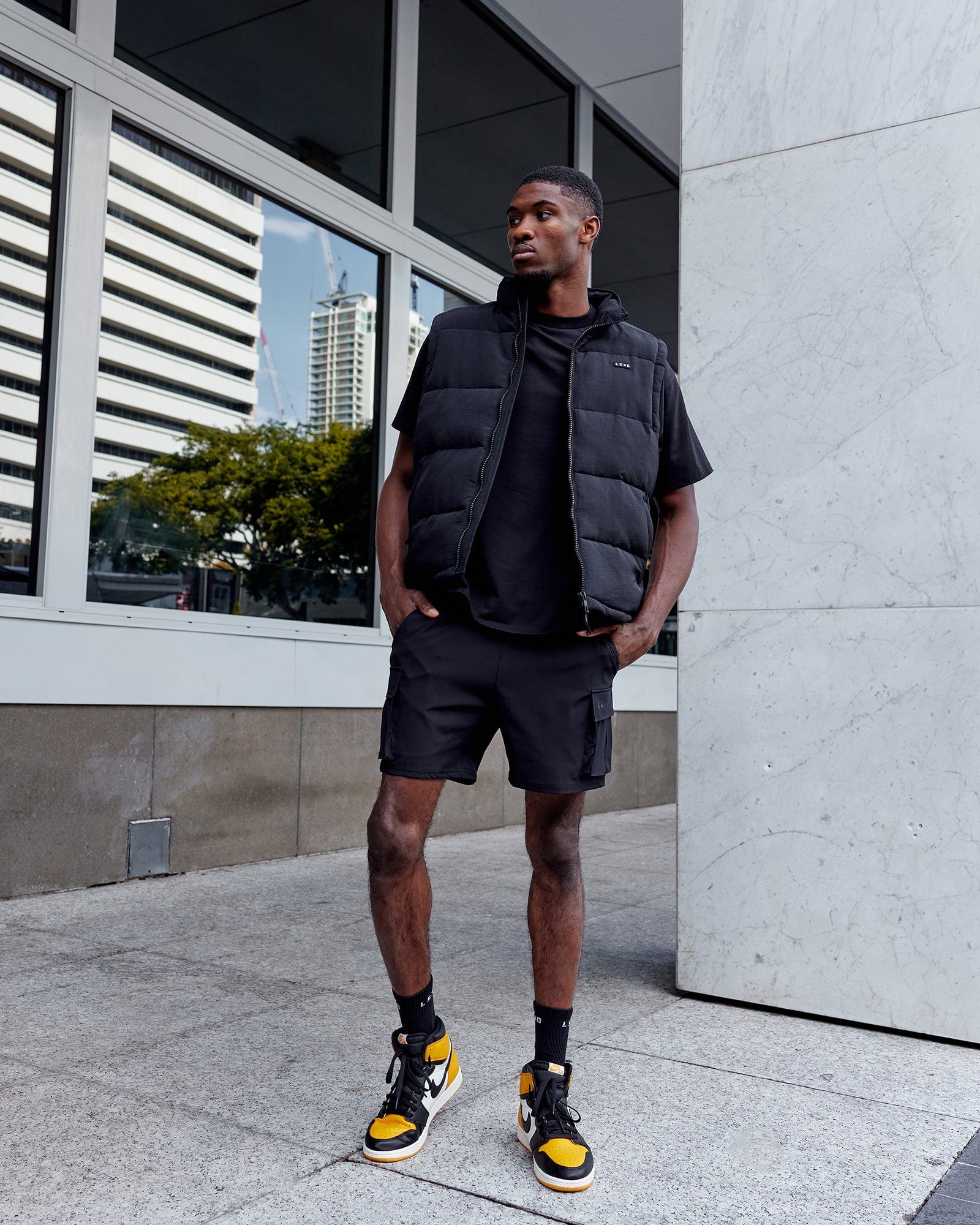 Man wearing Energy Stretch Performance Cargo Short - Black