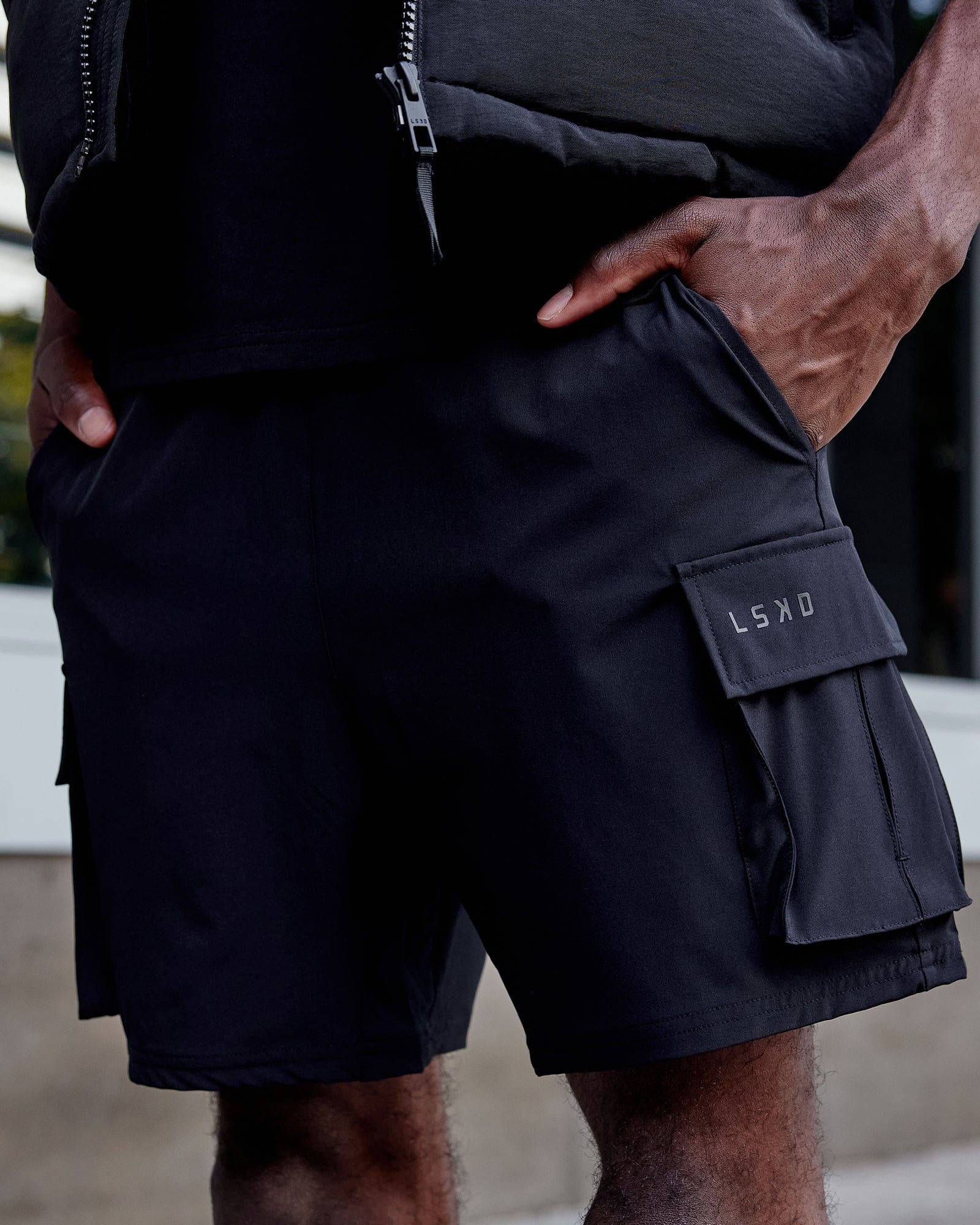 Man wearing Energy Stretch Performance Cargo Short - Black