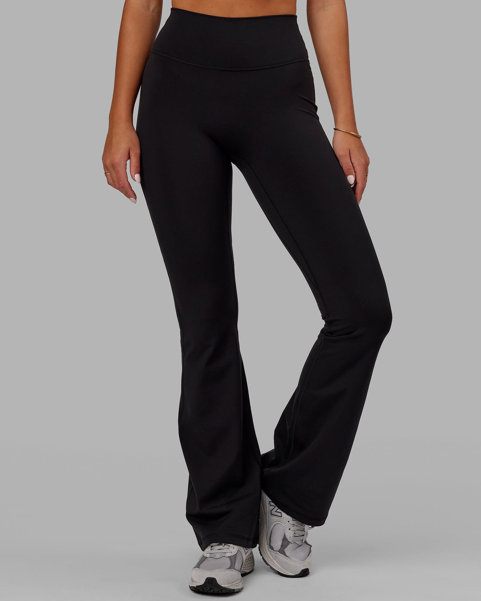 Woman wearing Everyday Flared Leggings - Black