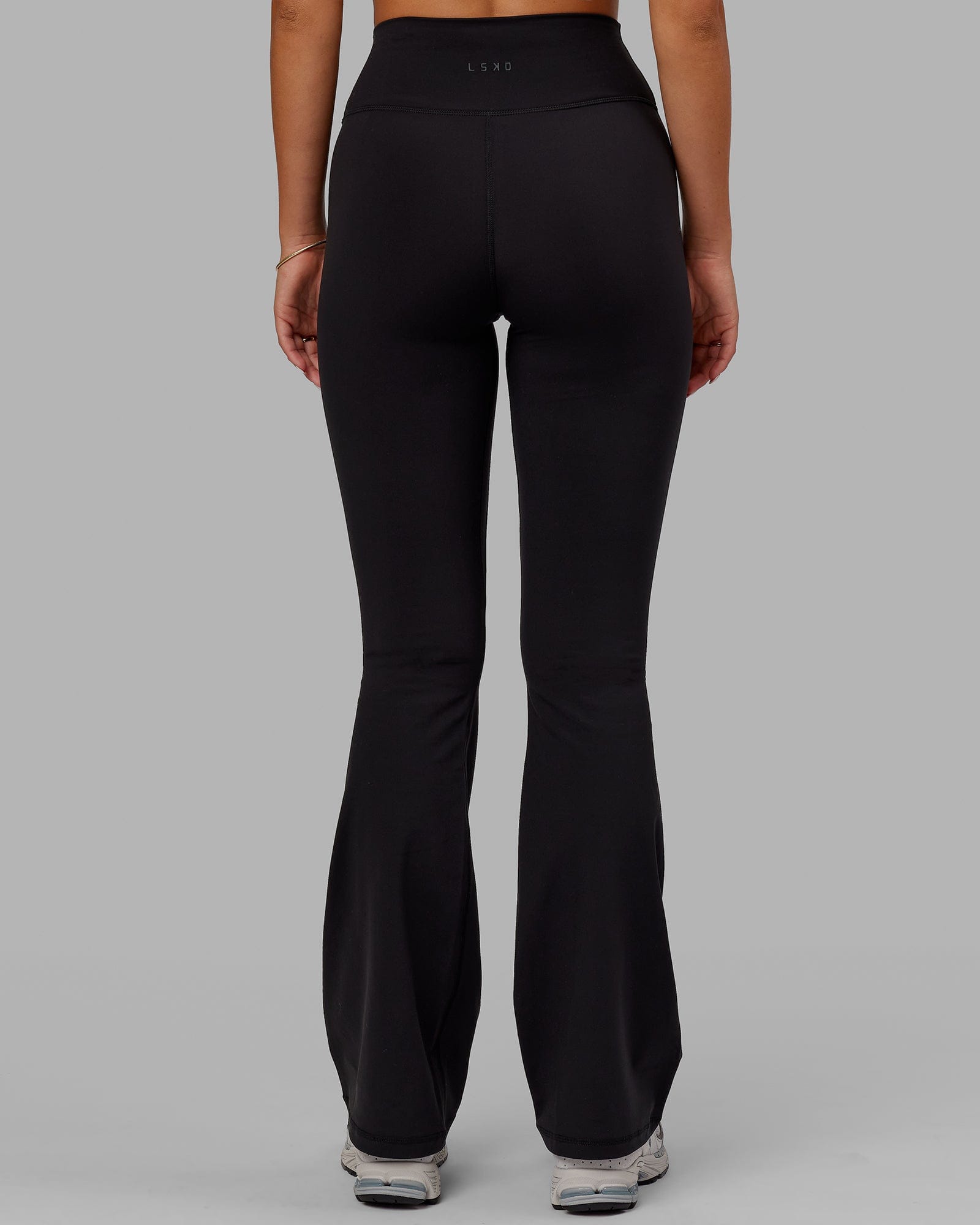 Woman wearing Everyday Flared Leggings - Black