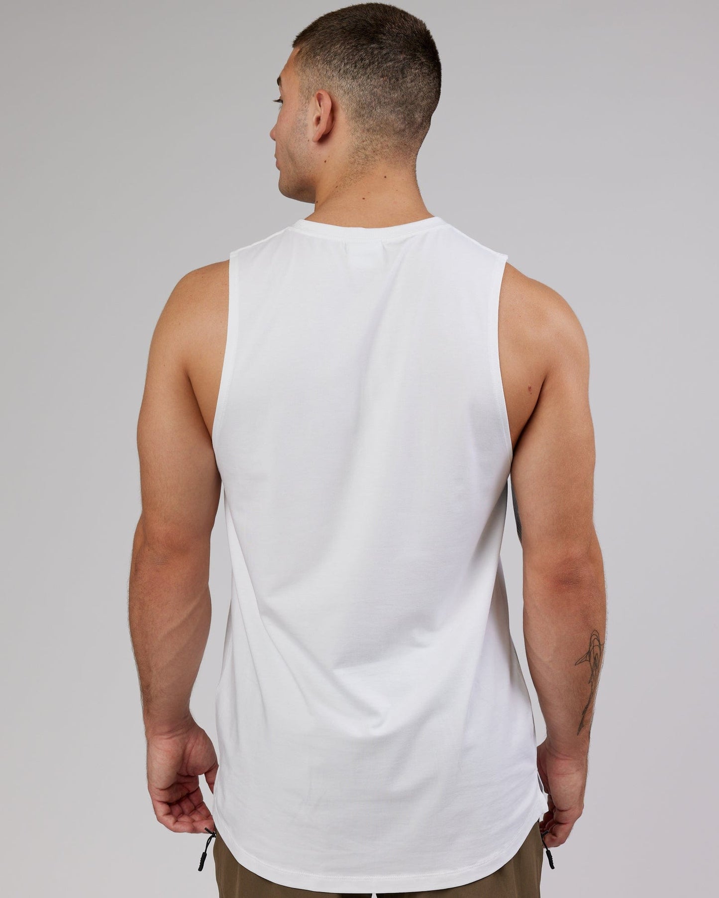 Man wearing PimaFLX Tank - White