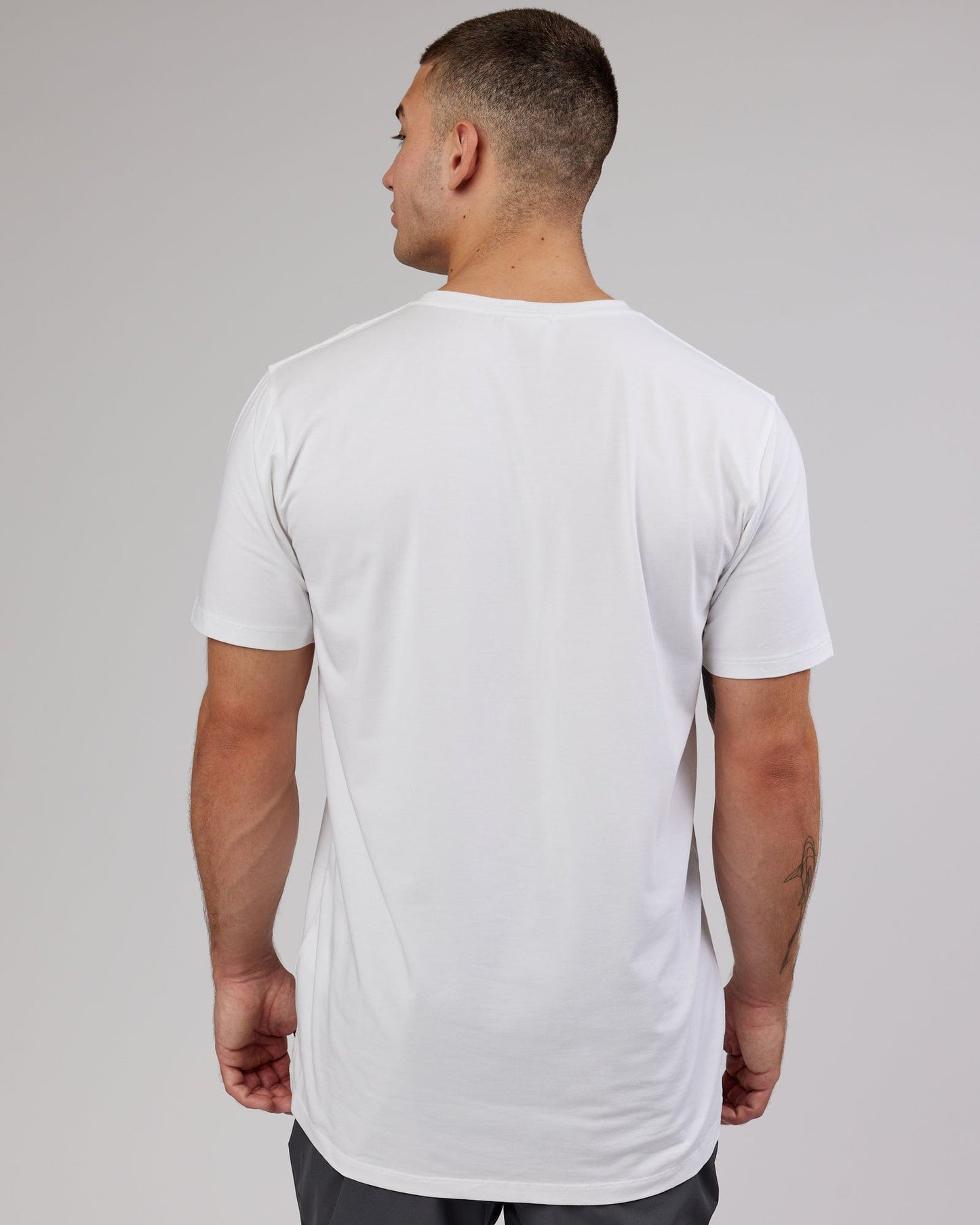 Man wearing PimaFLX Tee - White