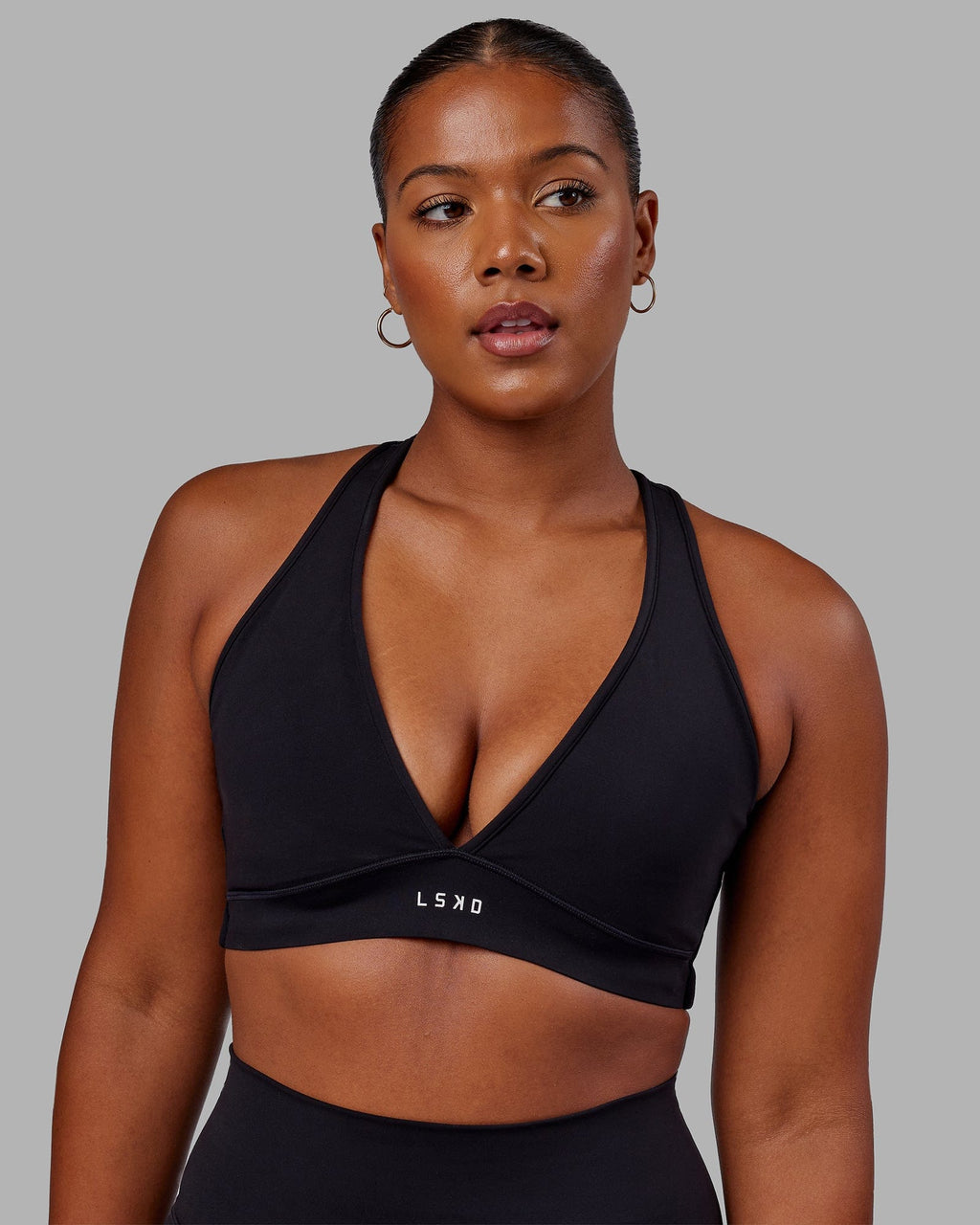 Woman wearing Stamina Sports Bra - Black