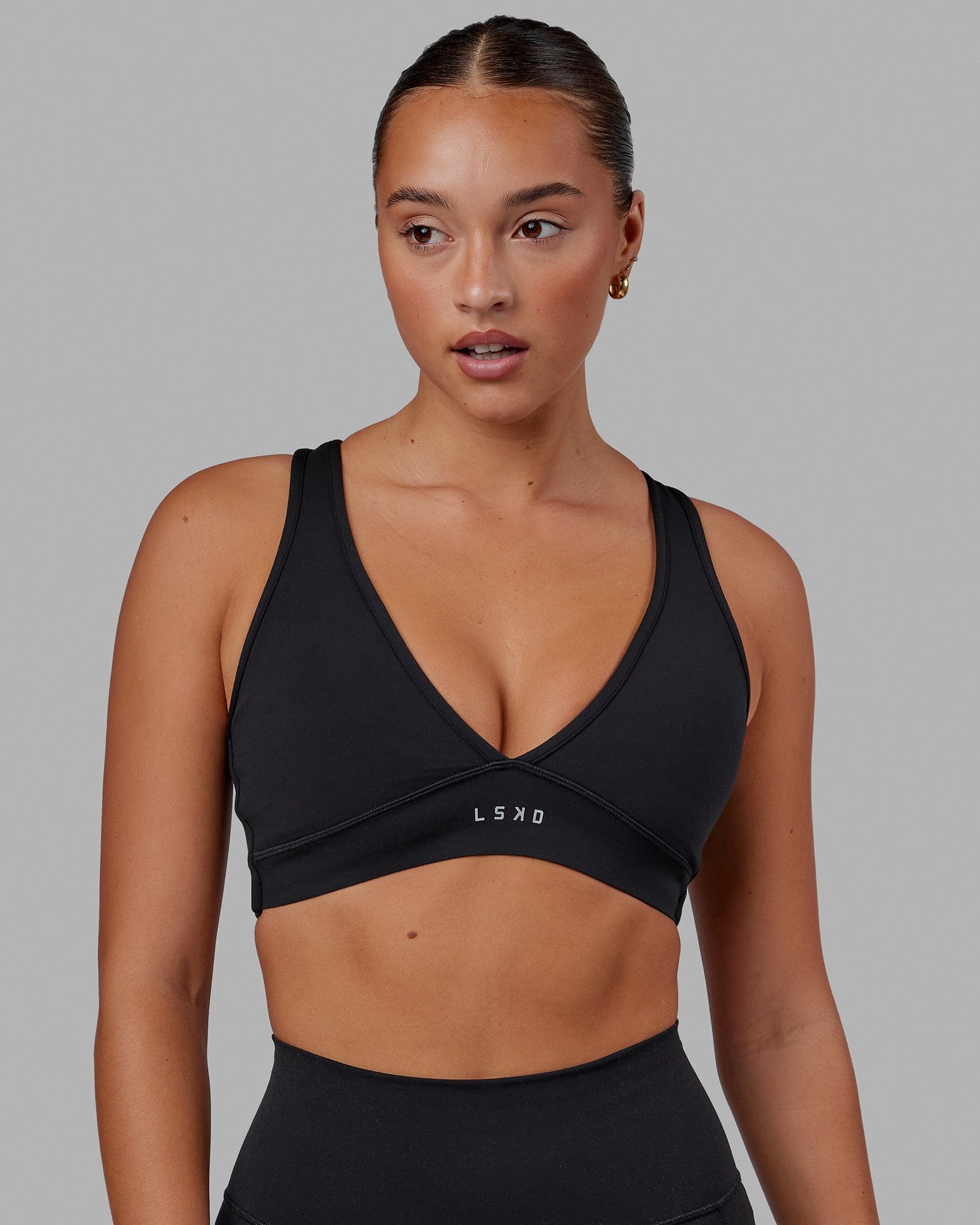 Woman wearing Stamina Sports Bra - Black