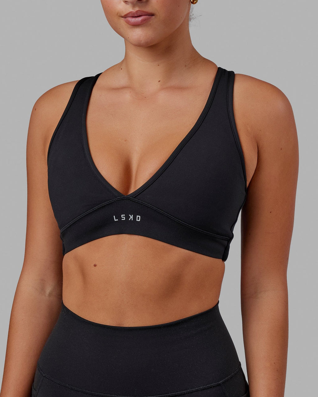 Woman wearing Stamina Sports Bra - Black