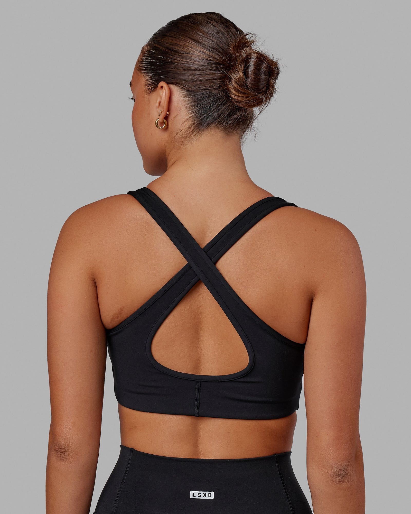 Woman wearing Stamina Sports Bra - Black