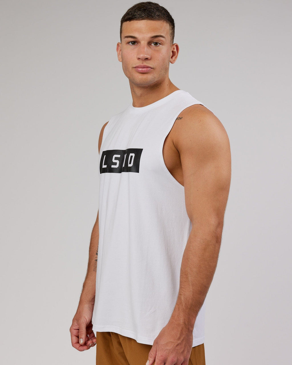 Man wearing Strength FLXCotton Training Fit Tank - White-Black