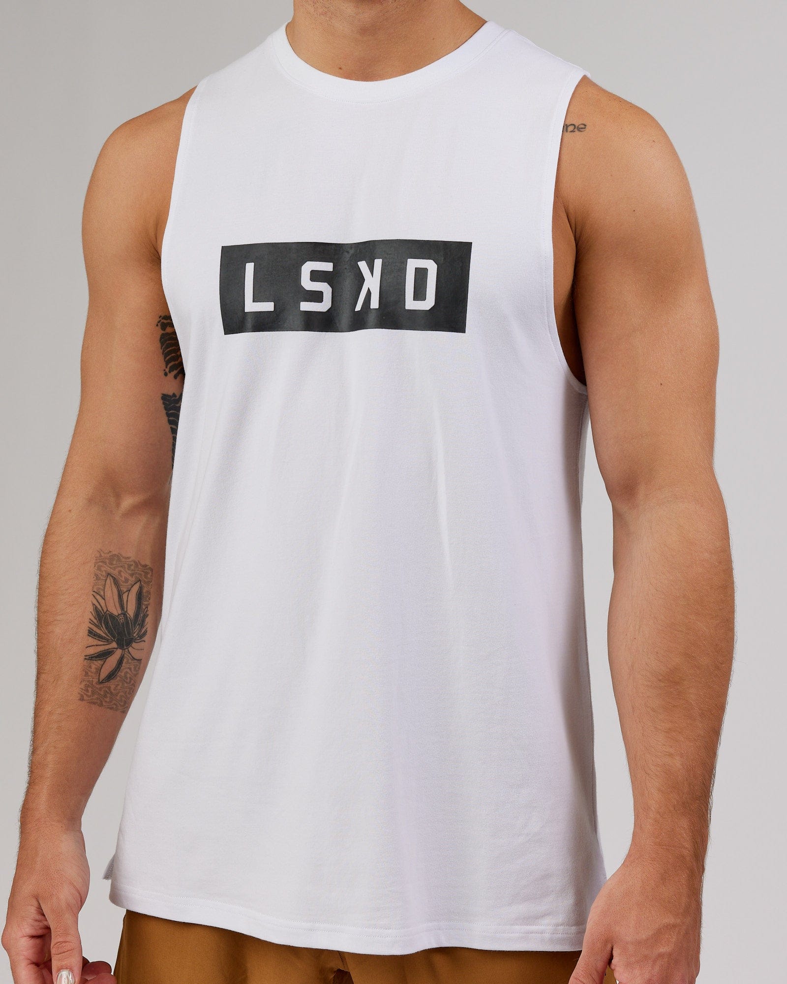 Man wearing Strength FLXCotton Training Fit Tank - White-Black