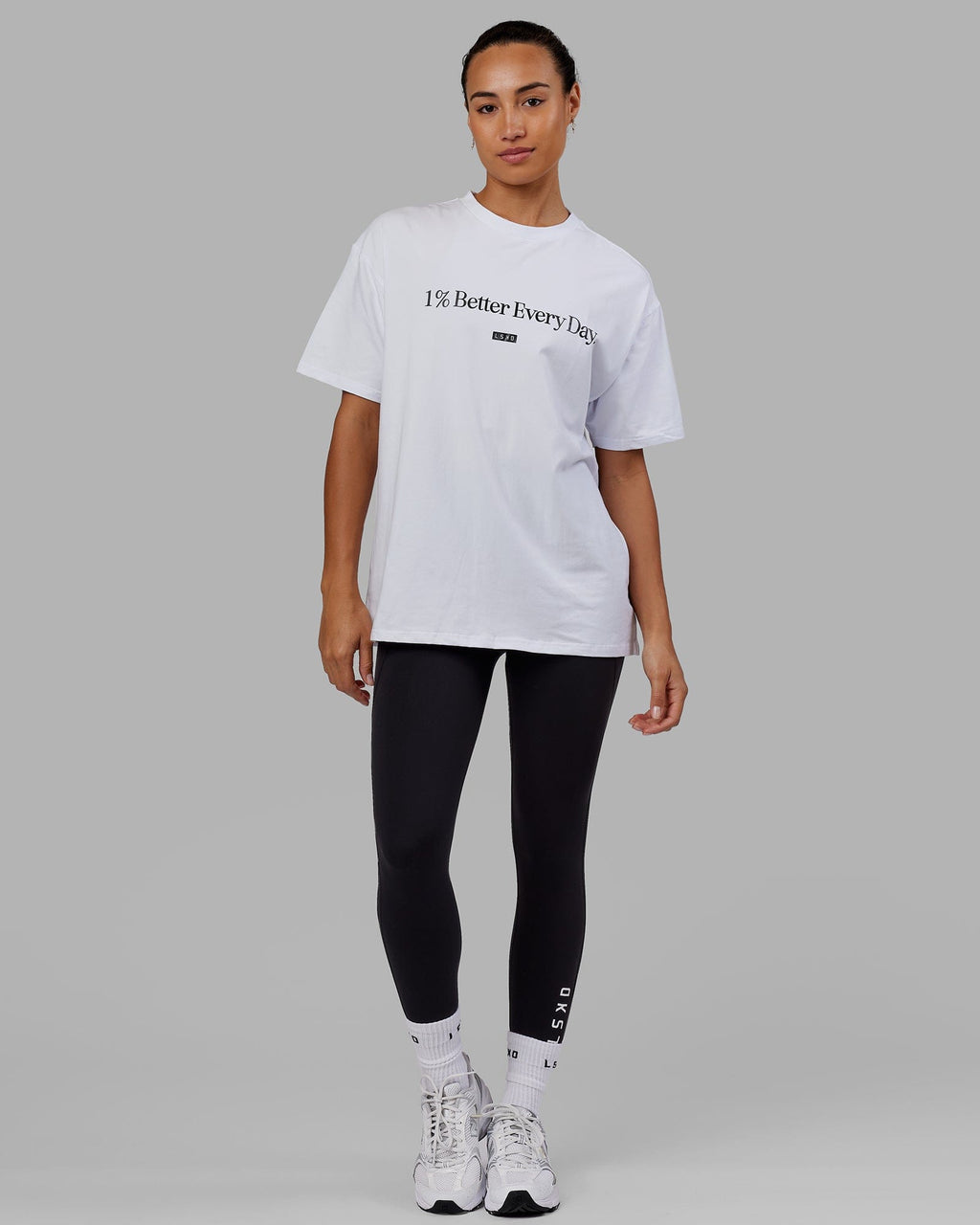 Woman wearing Unisex 1% Better FLXCotton Tee Oversize - White