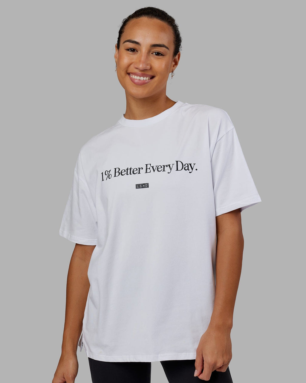 Woman wearing Unisex 1% Better FLXCotton Tee Oversize - White