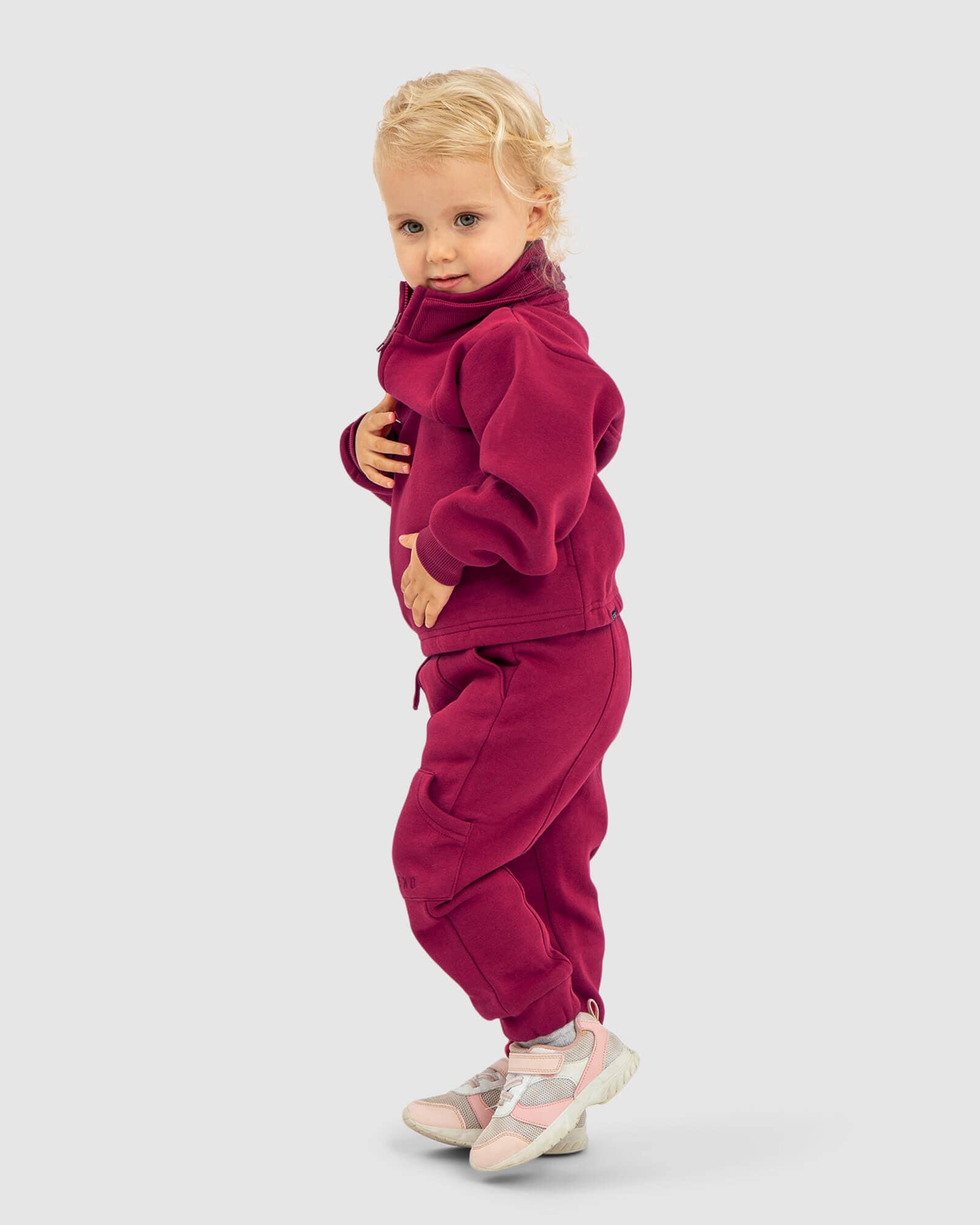 Model wearing Harley Track Pant (00-8) - Candy Apple