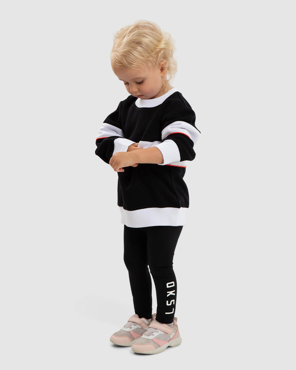 Model wearing Overtime Sweater (00-8) - Black-White-Fruit Punch