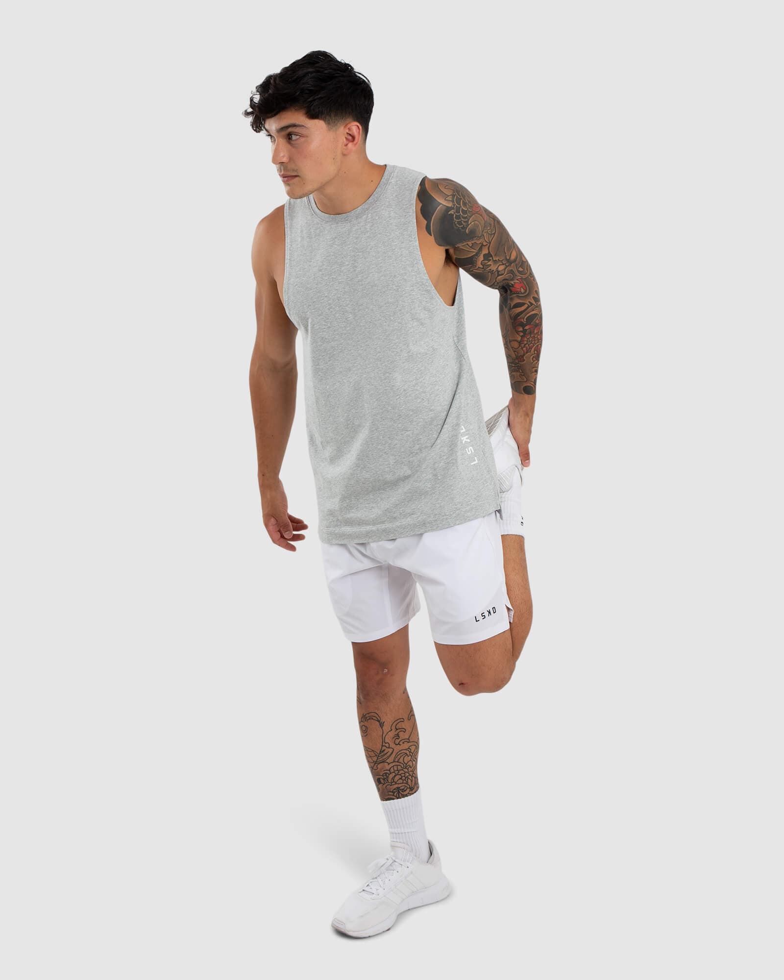 Model wearing Vitality Tank - Lt Grey Marl