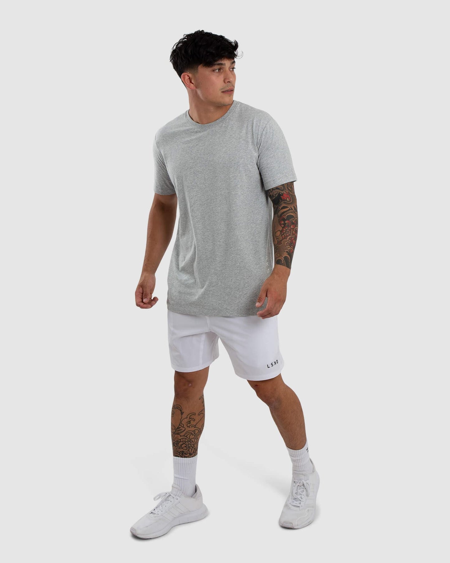 Model wearing Vitality Tee - Lt Grey Marl