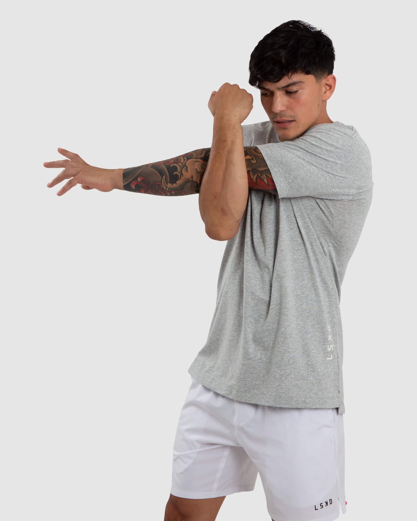 Model wearing Vitality Tee - Lt Grey Marl