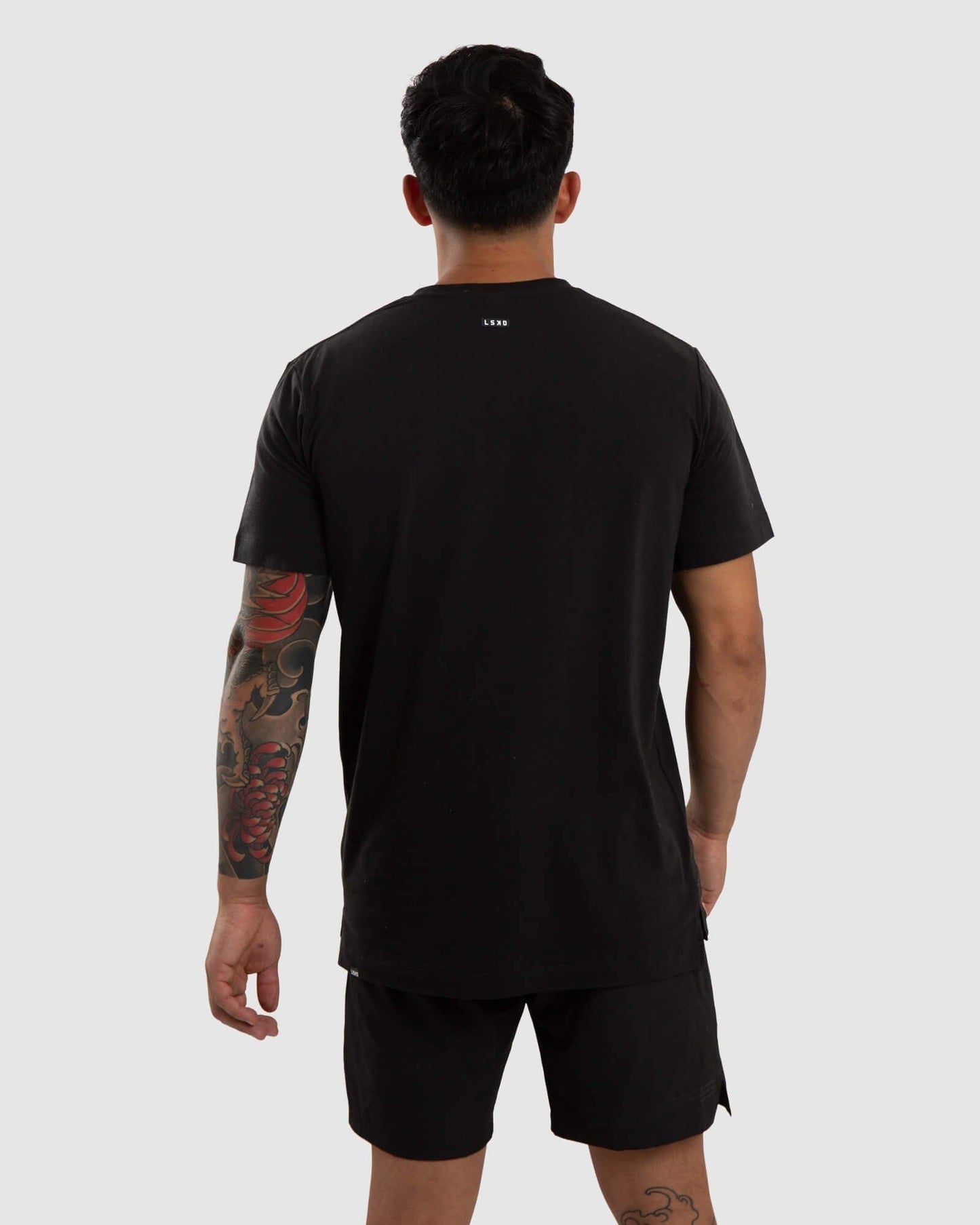 Model wearing Vitality Tee - Black