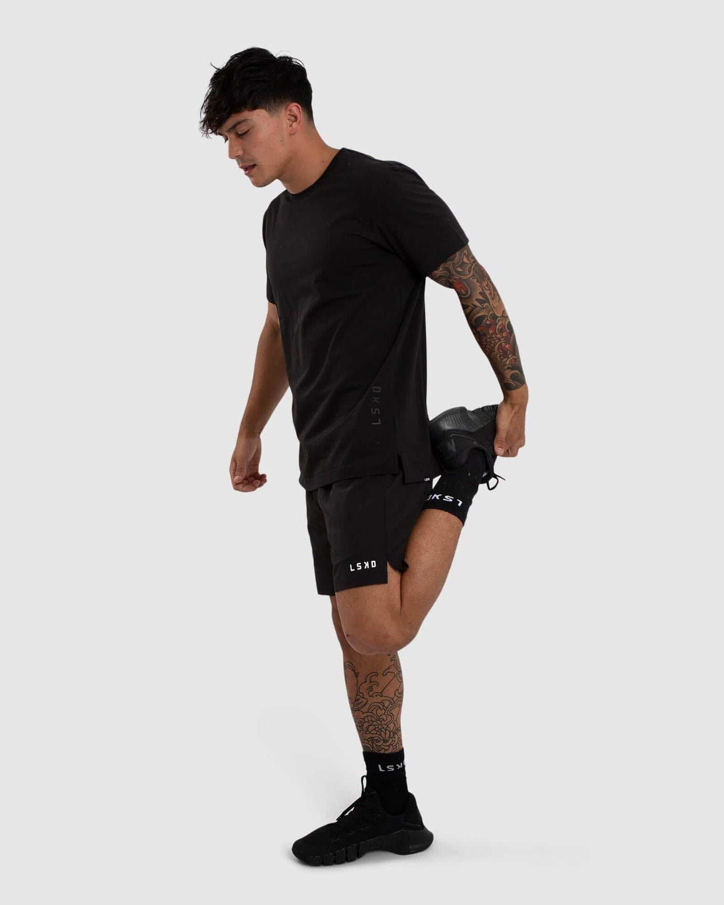 Model wearing Vitality Tee - Black