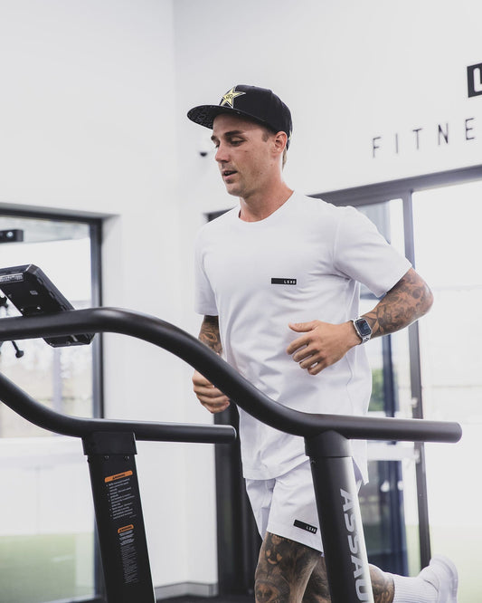 Model wearing LSKD x LM Tee - White