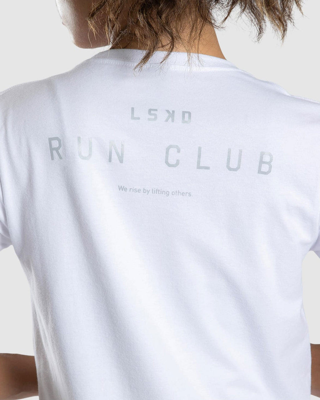 Model wearing Run Club FLXDRY Performance Tee - White-Reflective