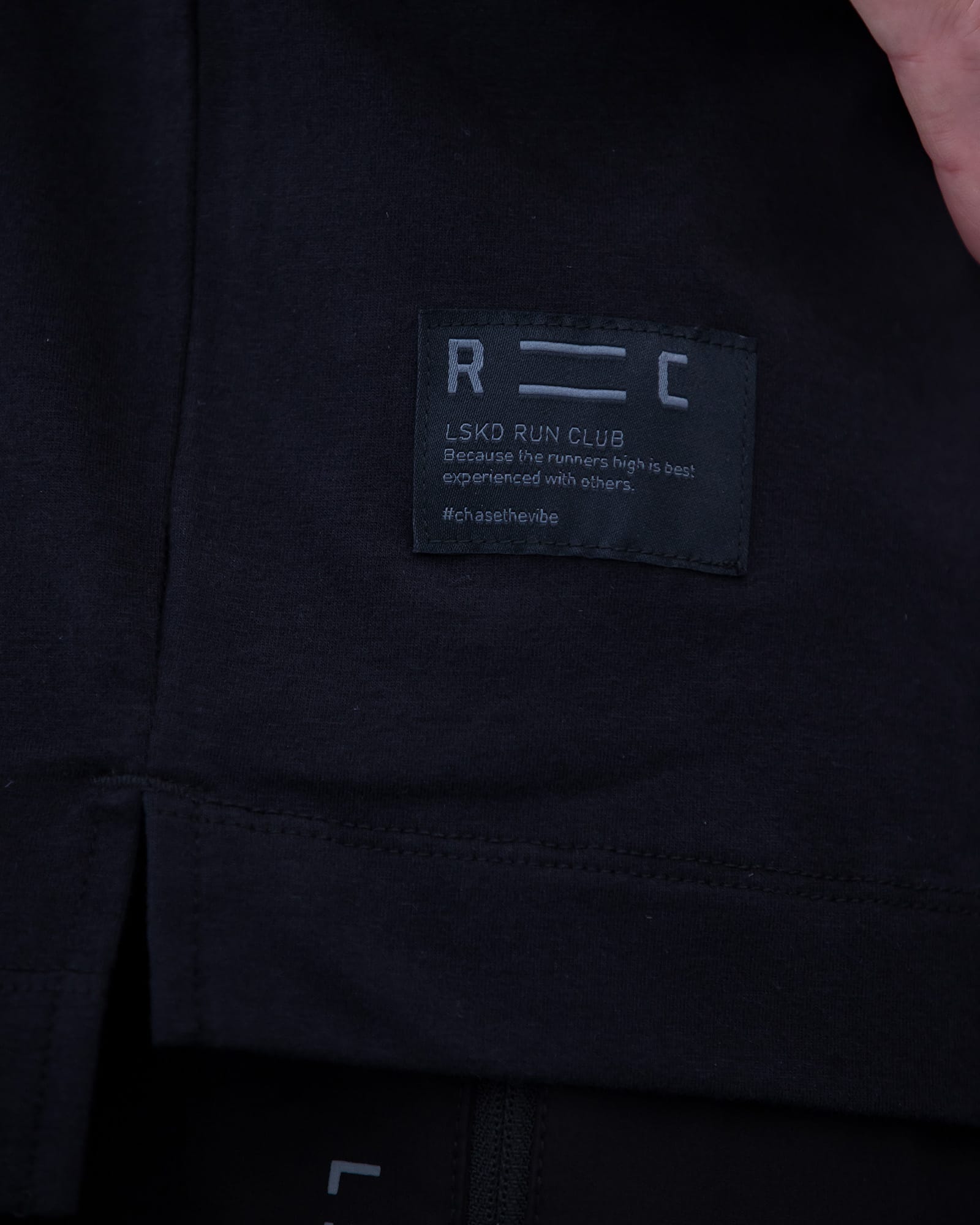 Model wearing Run Club FLXDRY Performance Tee - Black-Reflective