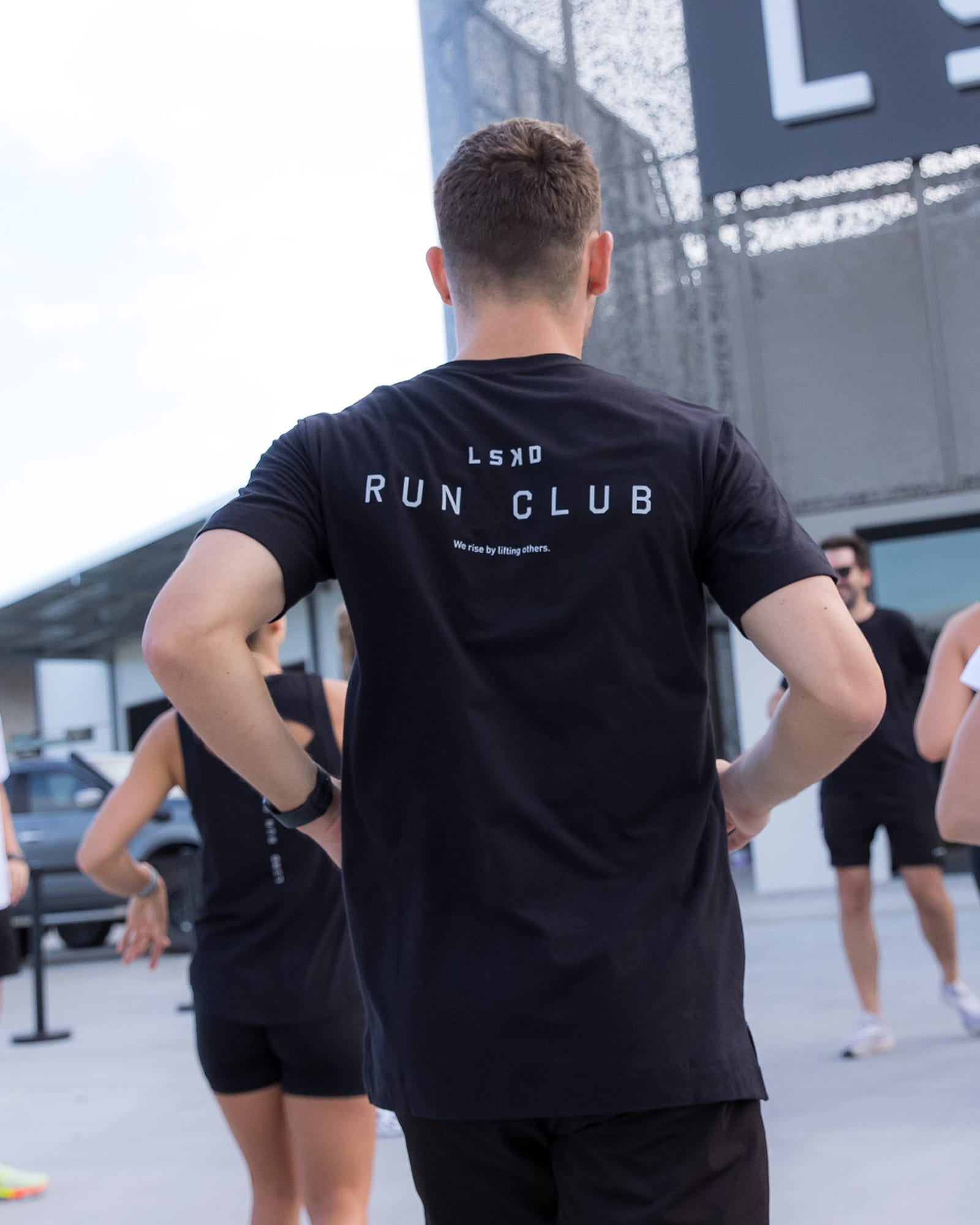 Model wearing Run Club FLXDRY Performance Tee - Black-Reflective