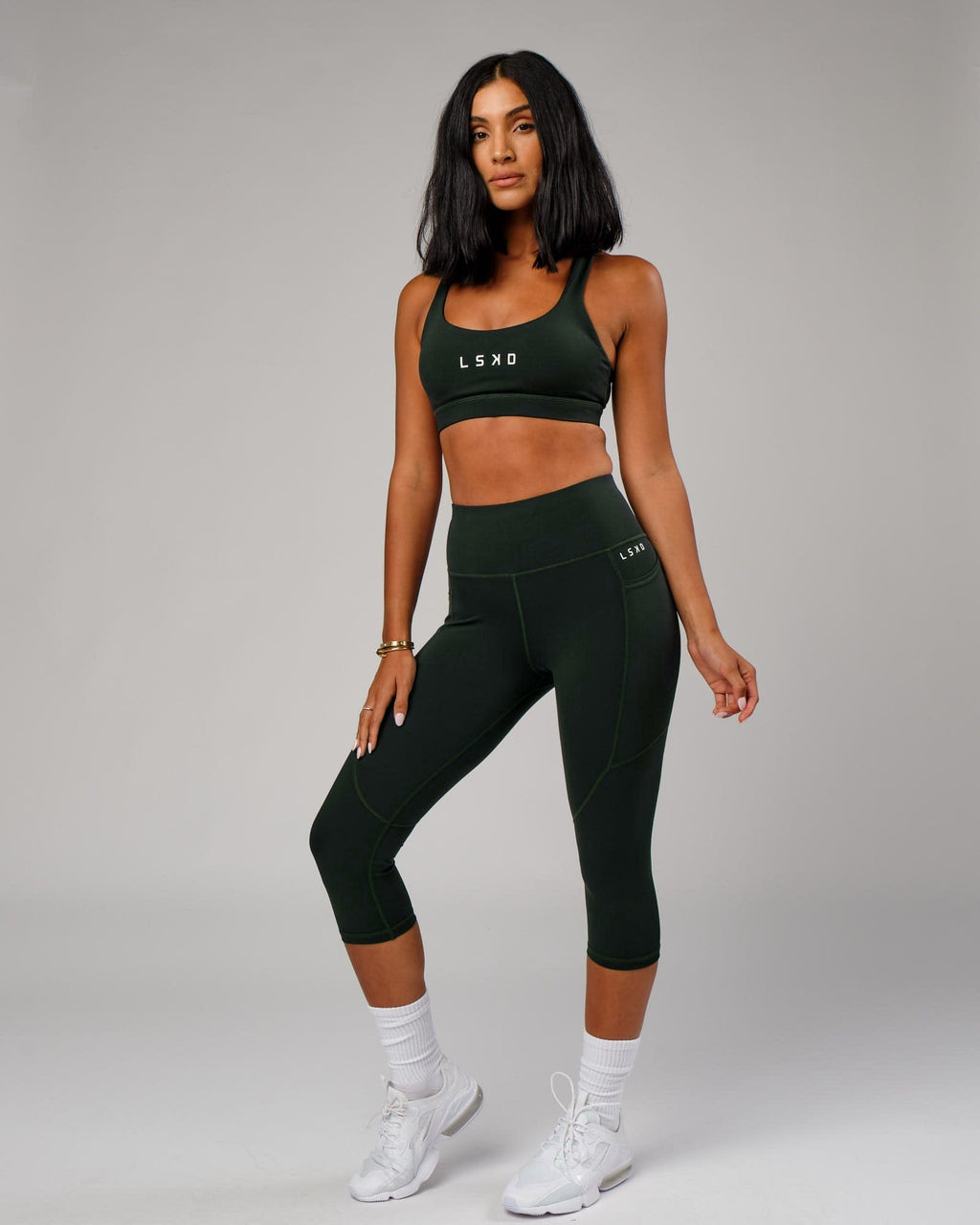 Model wearing Rep 3/4 Length Tight - Forest