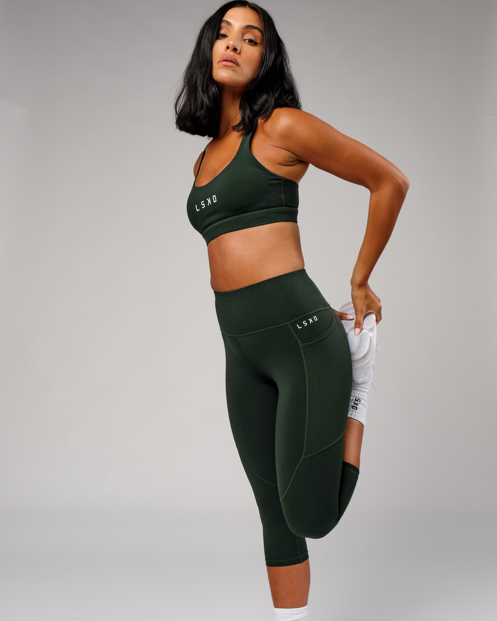 Model wearing Rep 3/4 Length Tight - Forest